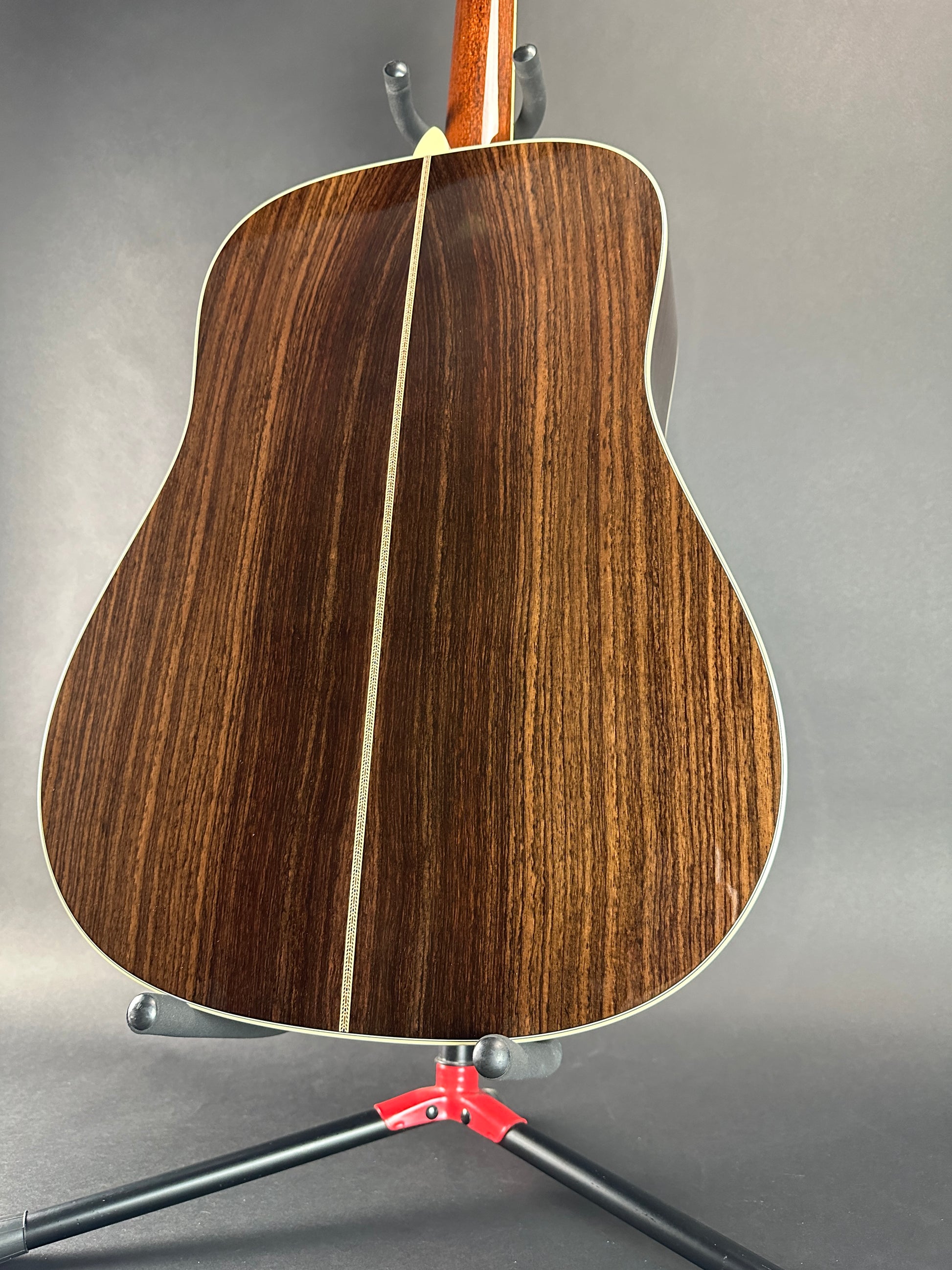 Back angle of Used Martin D-42 Natural.