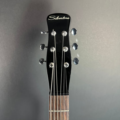 Front of headstock of Used Silvertone 1303/U2 Black.