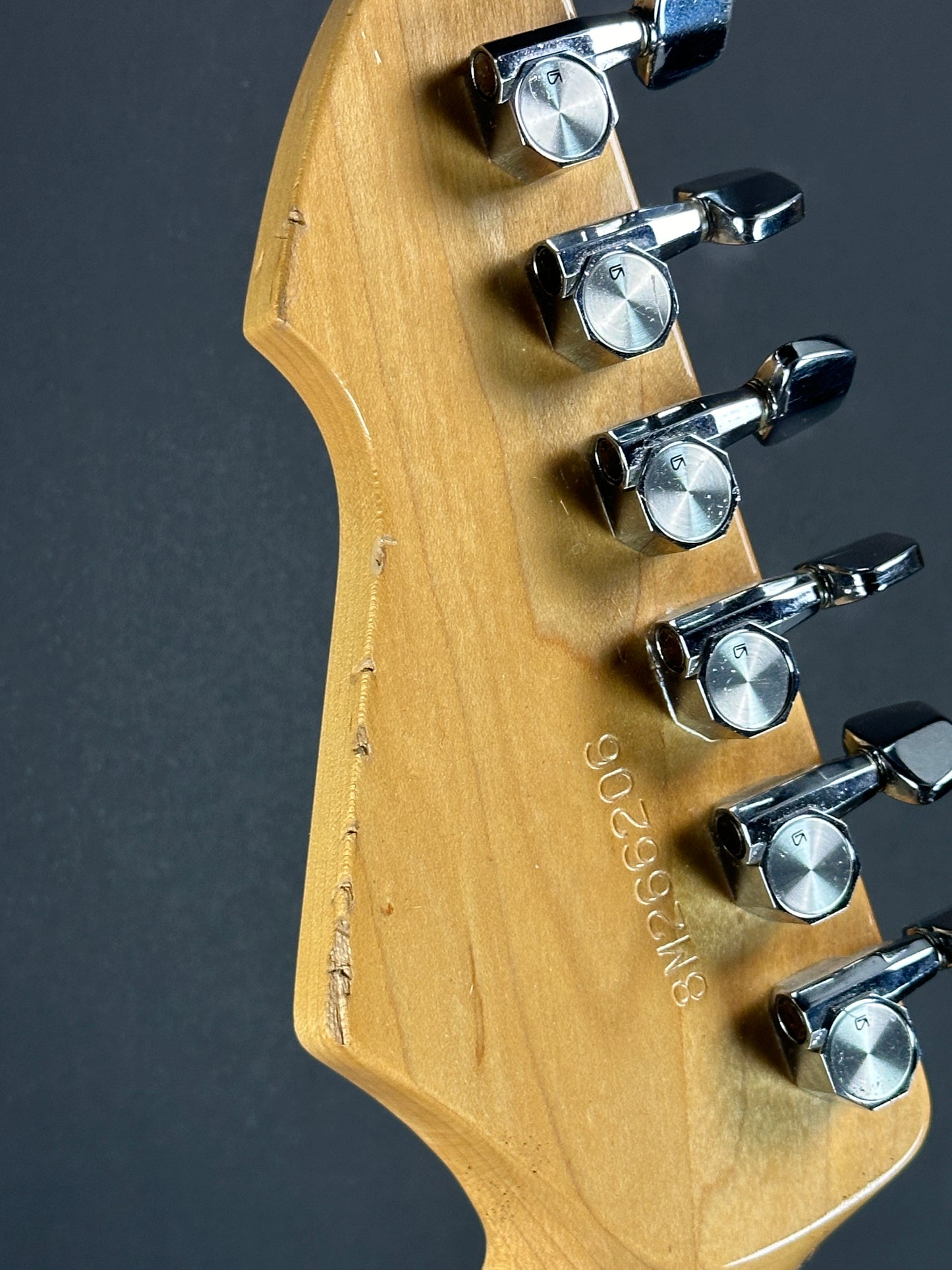 Marks on back of headstock of Used 1978 Peavey T-60 Natural.