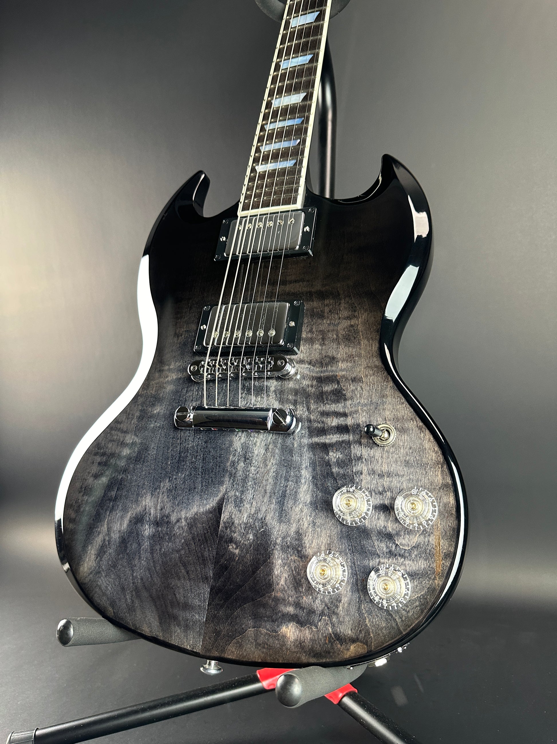 Front angle of Used Gibson SG Modern Trans Ebony Fade.