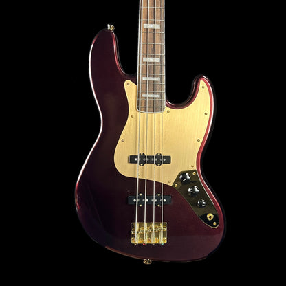 Front of body of Used Squier 40th Anniversary Jazz Bass Ruby Red Metallic.