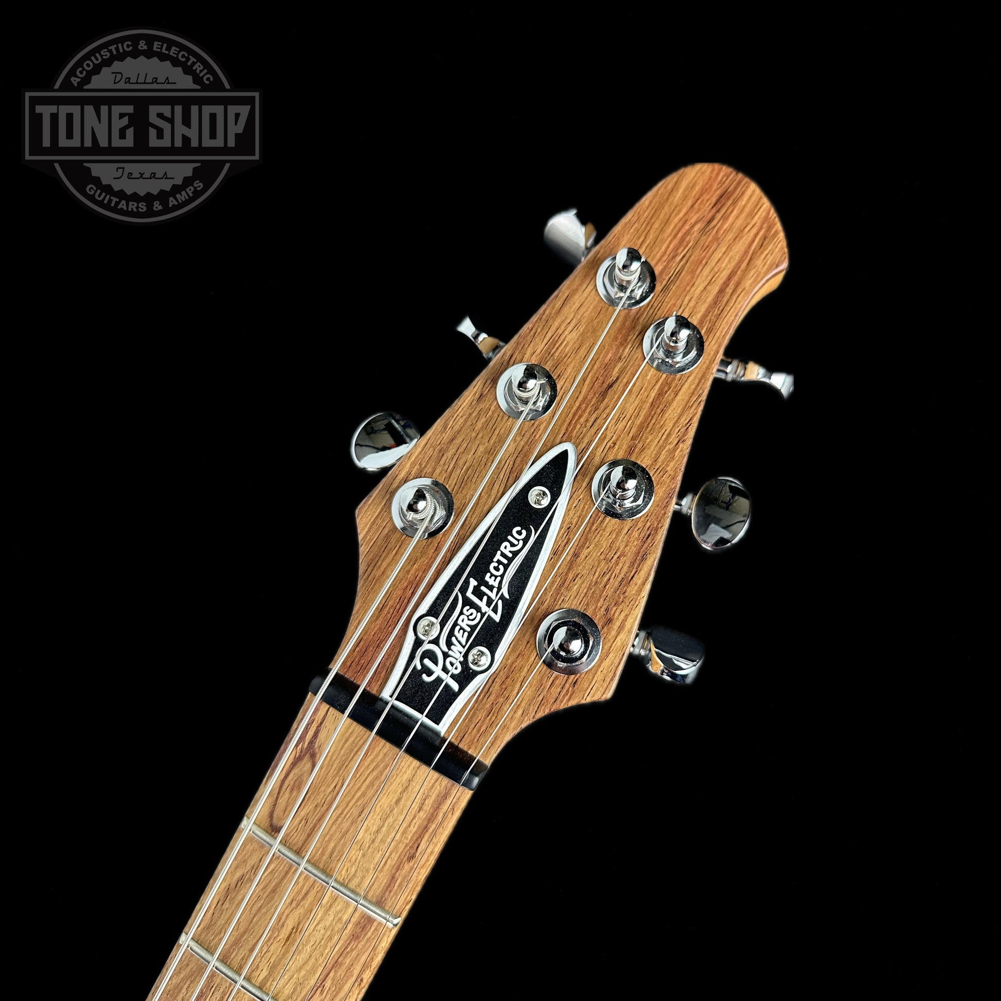 Front of headstock of Powers Electric A-Type Crayon Gray PF42 Pearl Ebony Cool Hard Tail.