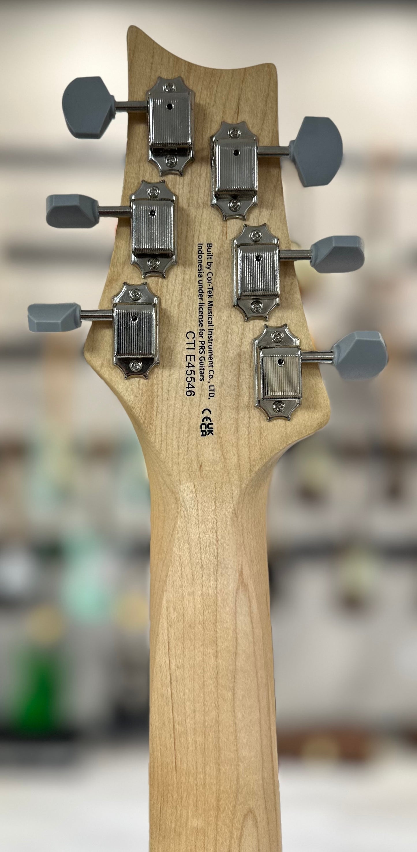 Back of headstock of Used PRS SE Silversky Evergreen TSS4243