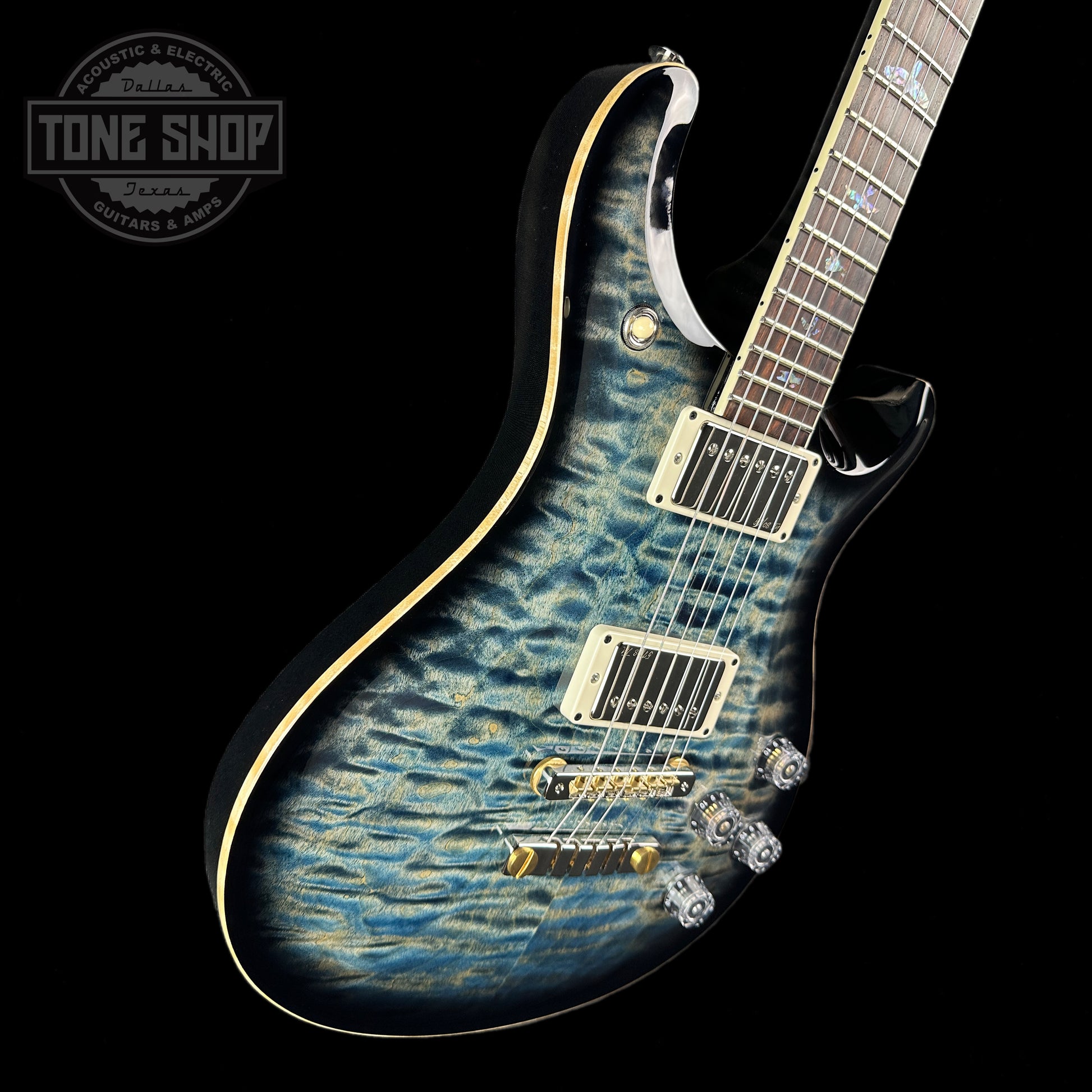 Front angle of PRS Wood Library McCarty 594 10-top Quilt Faded Whale Blue Smokeburst.