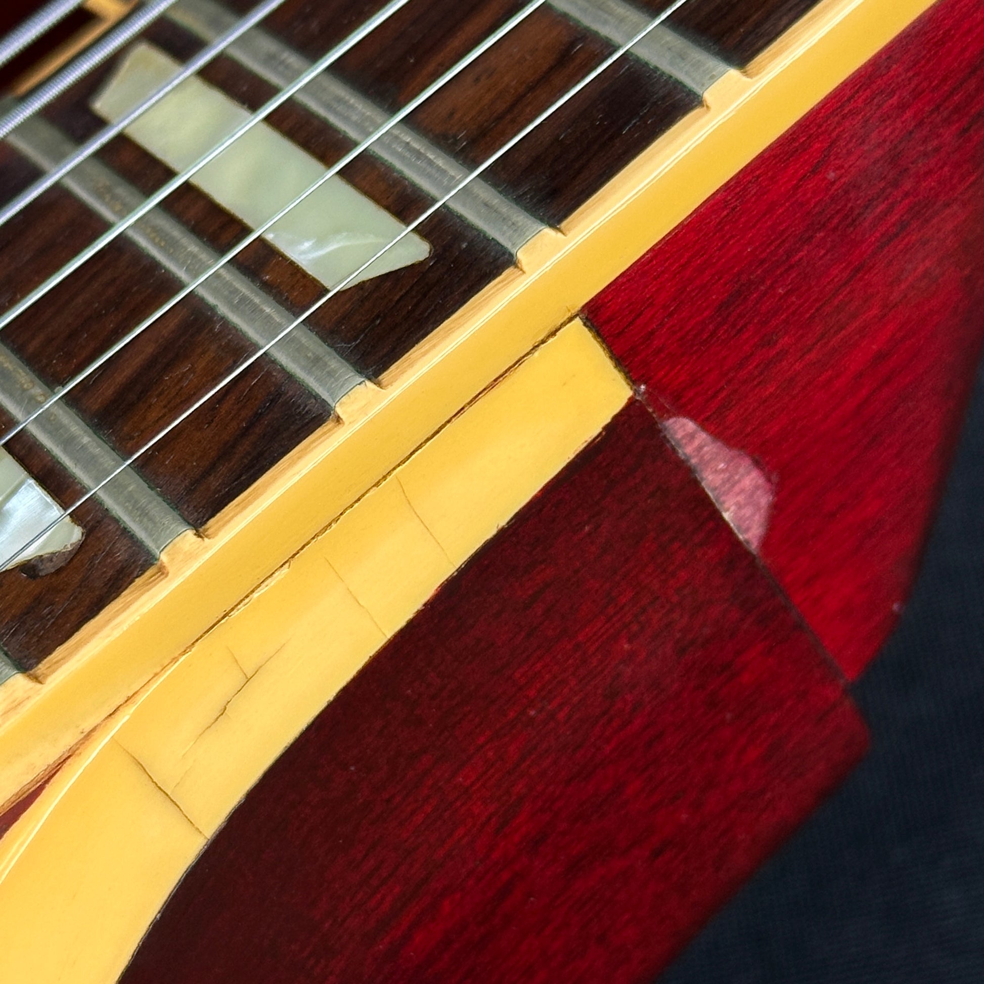 Damage near neckjoint of Vintage 1977 Gibson Les Paul Standard Wine Red.