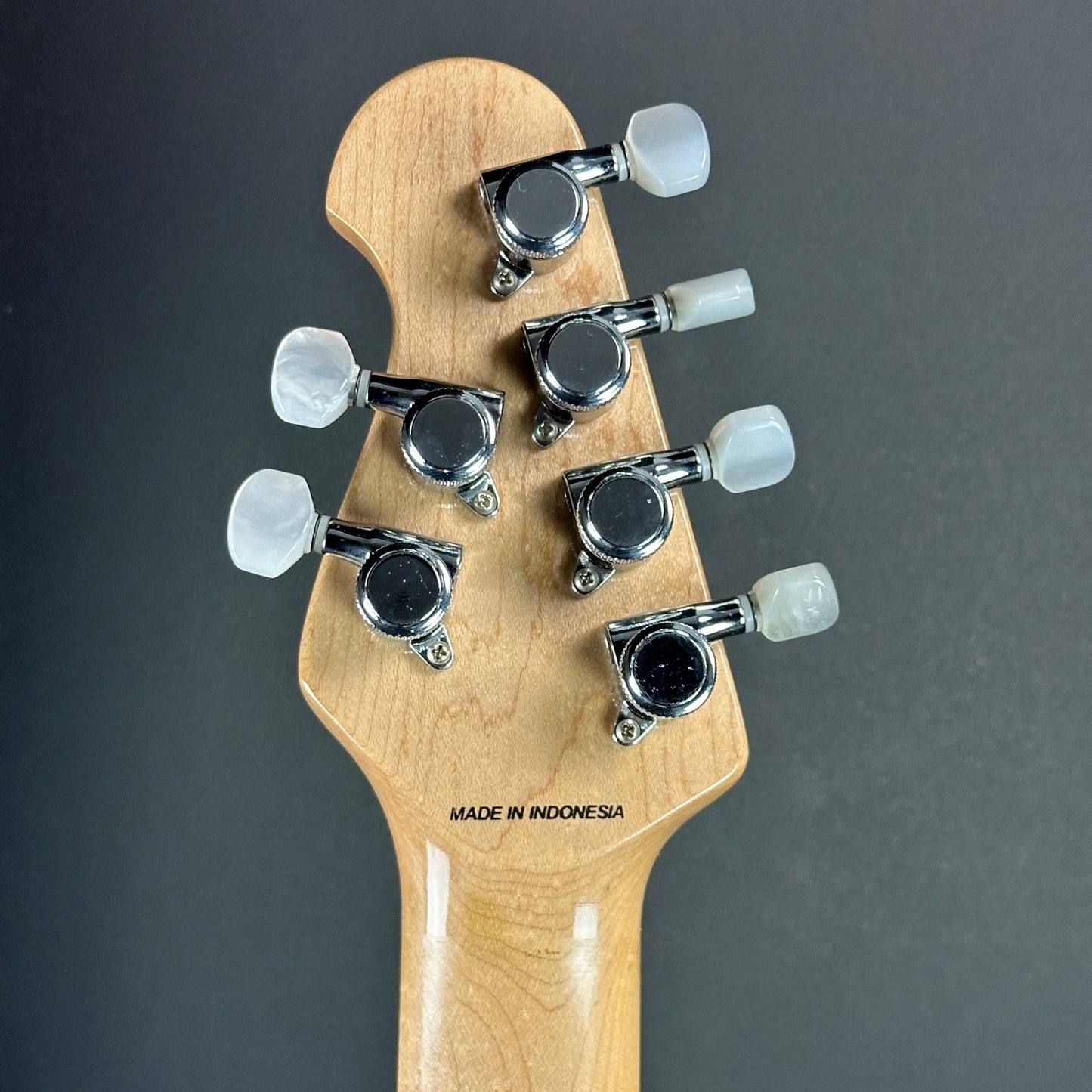 Back of headstock of Used Sterling by MusicMan JP100D.