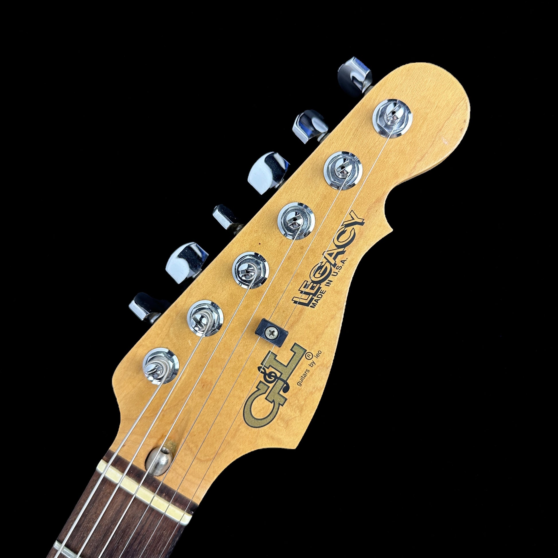 Front of headstock of Used 1992 G&L Legacy Sunburst.
