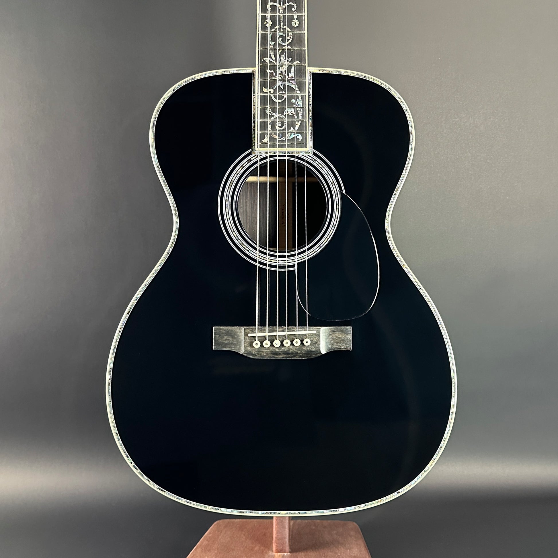 Front of Martin Custom Shop Black OM-45 Tree of Life Sitka/EIR.