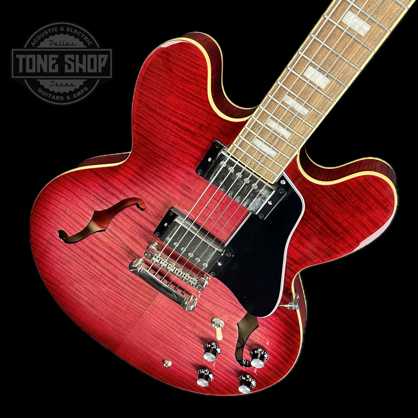 Front angle of Used Epiphone ES-335 Figured Limited Raspberry Burst.