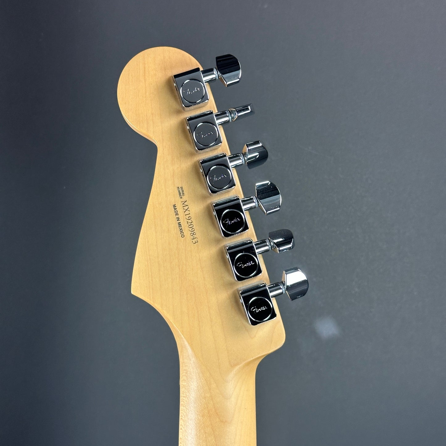 Back of headstock of Used Fender Player Stratocaster Plus Top Sunburst.