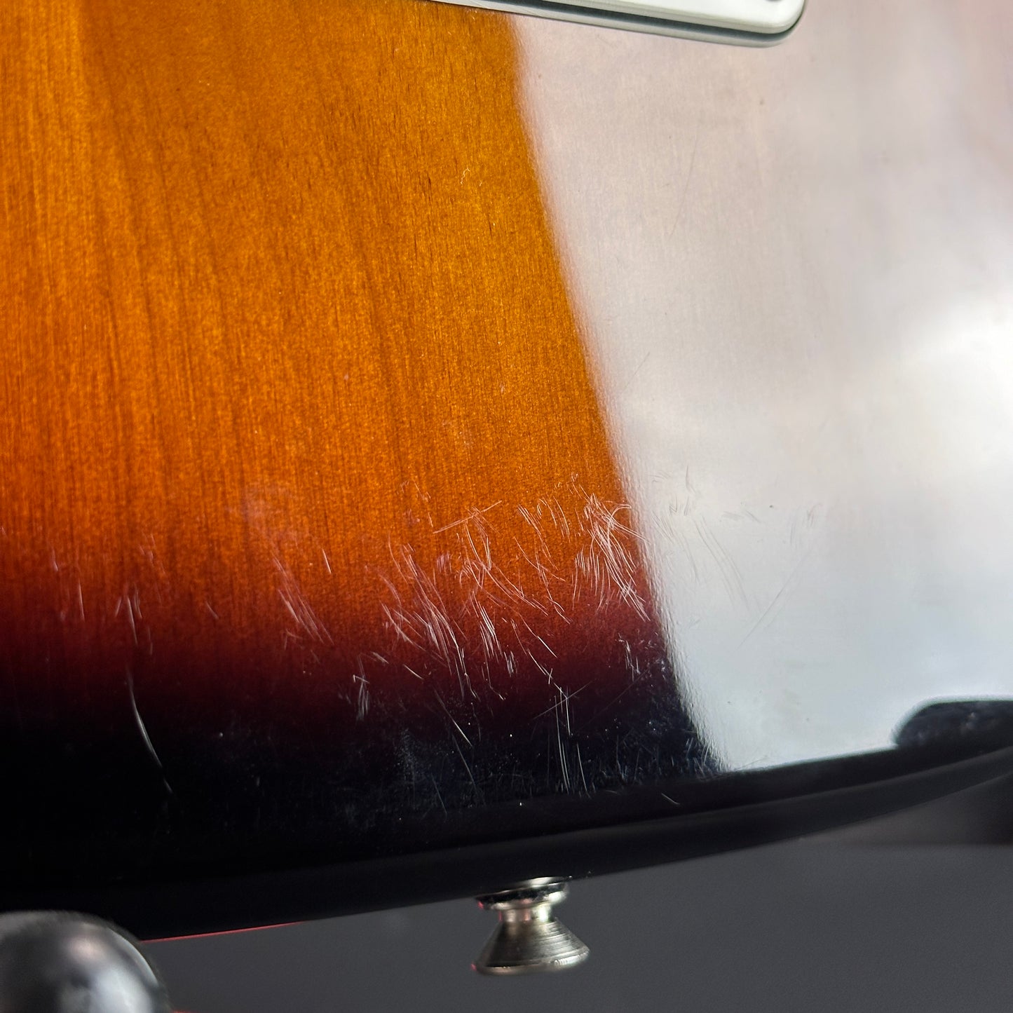 Scratches on back of Used Fender American Special Strat Burst.