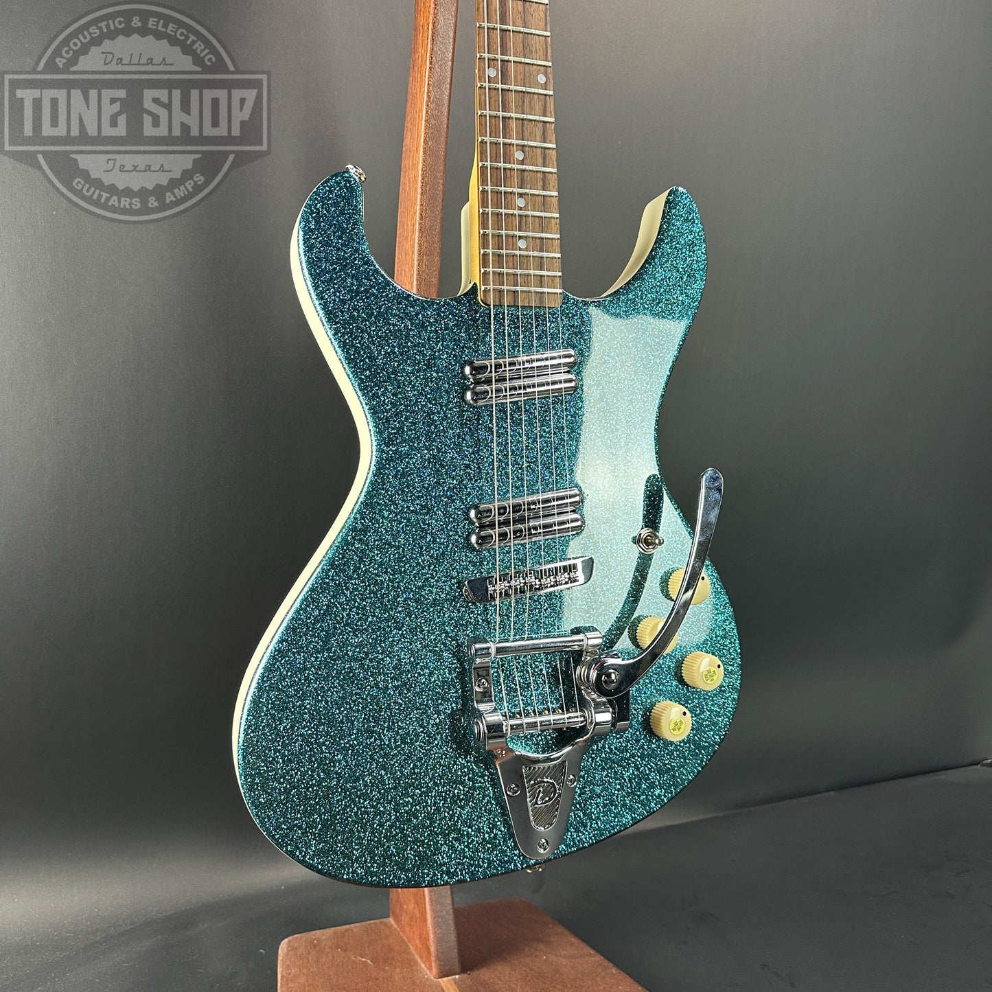 Front angle of Used Danelectro Hodad Green Sparkle.