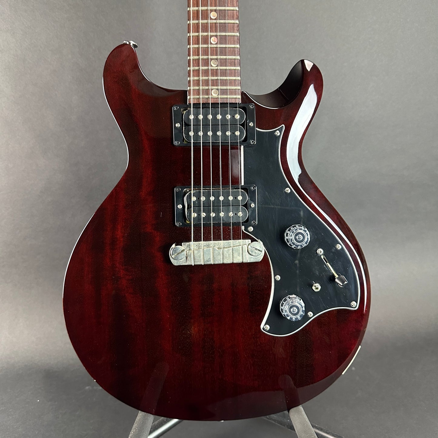 Front of body of Used PRS USA Mira Dark Cherry.