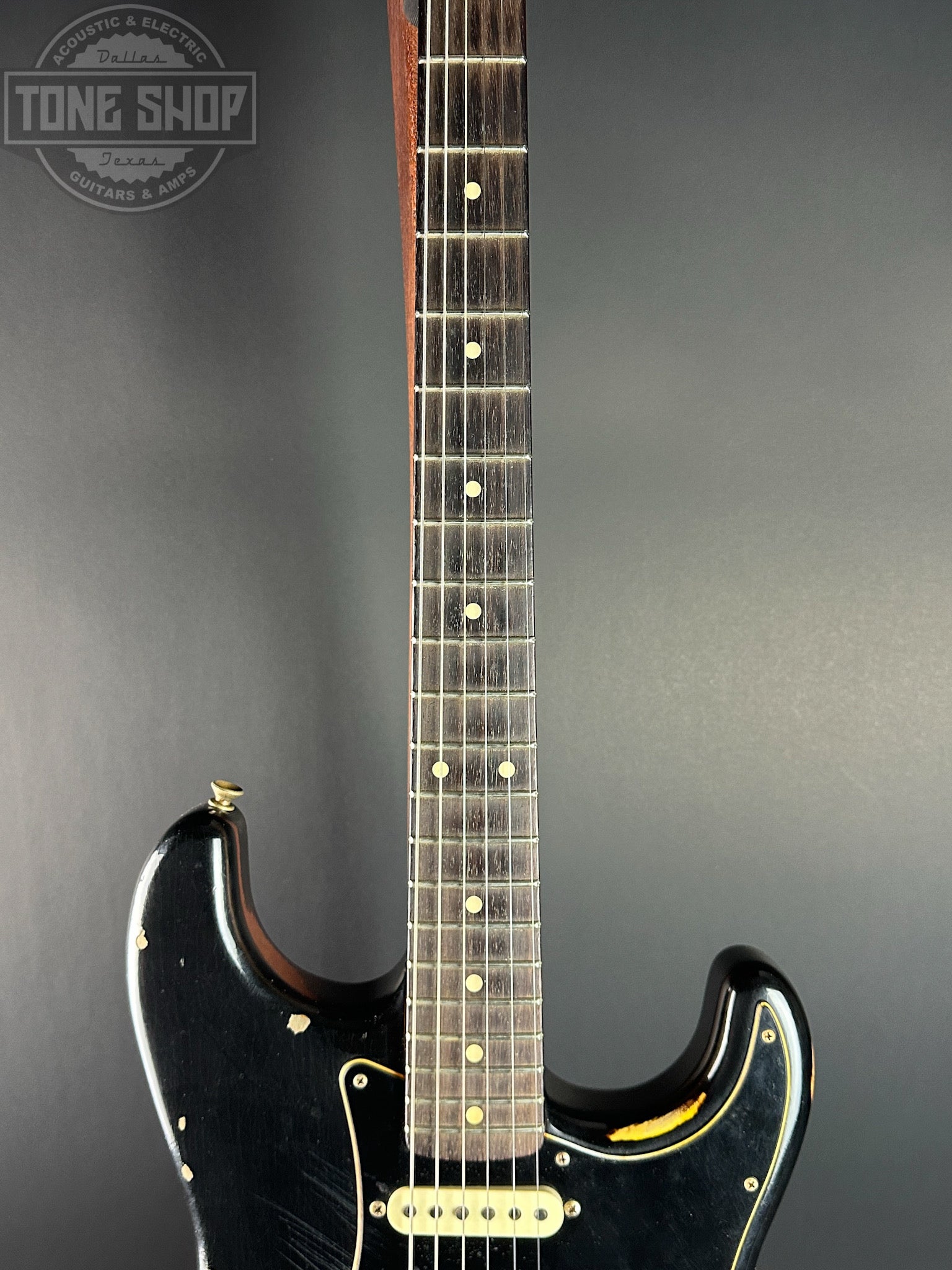 Fretboard of Used Fender Ltd Dual Mag II Strat Relic Black.