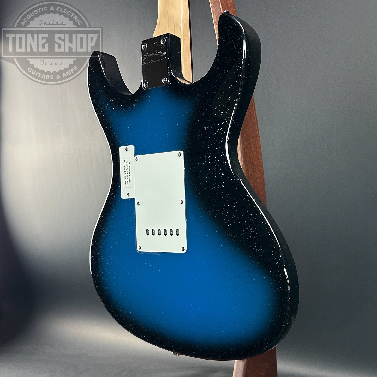 Back angle of Used Danelectro Danoblaster Hearsay Blue Sparkle Burst.