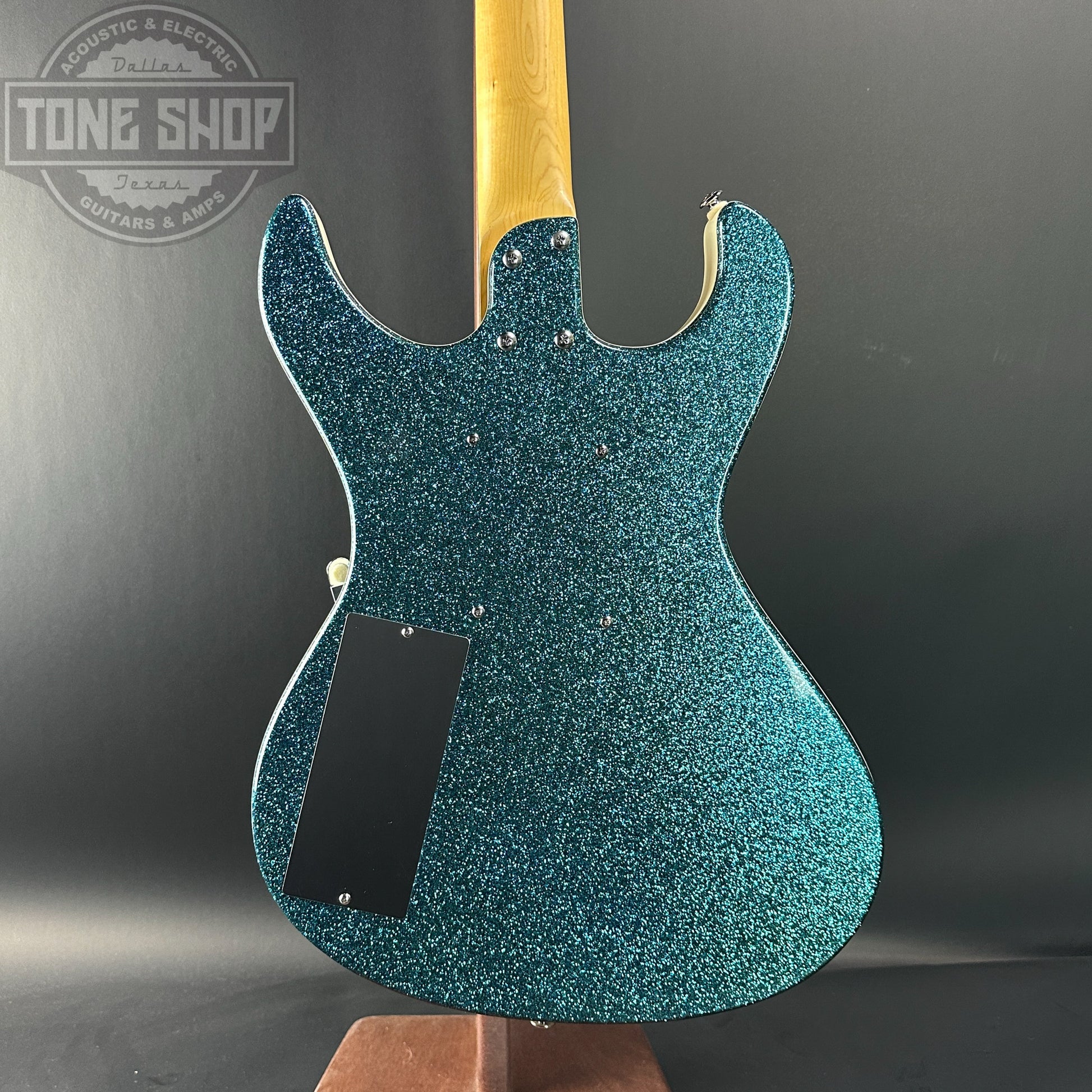 Back of Used Danelectro Hodad Green Sparkle.