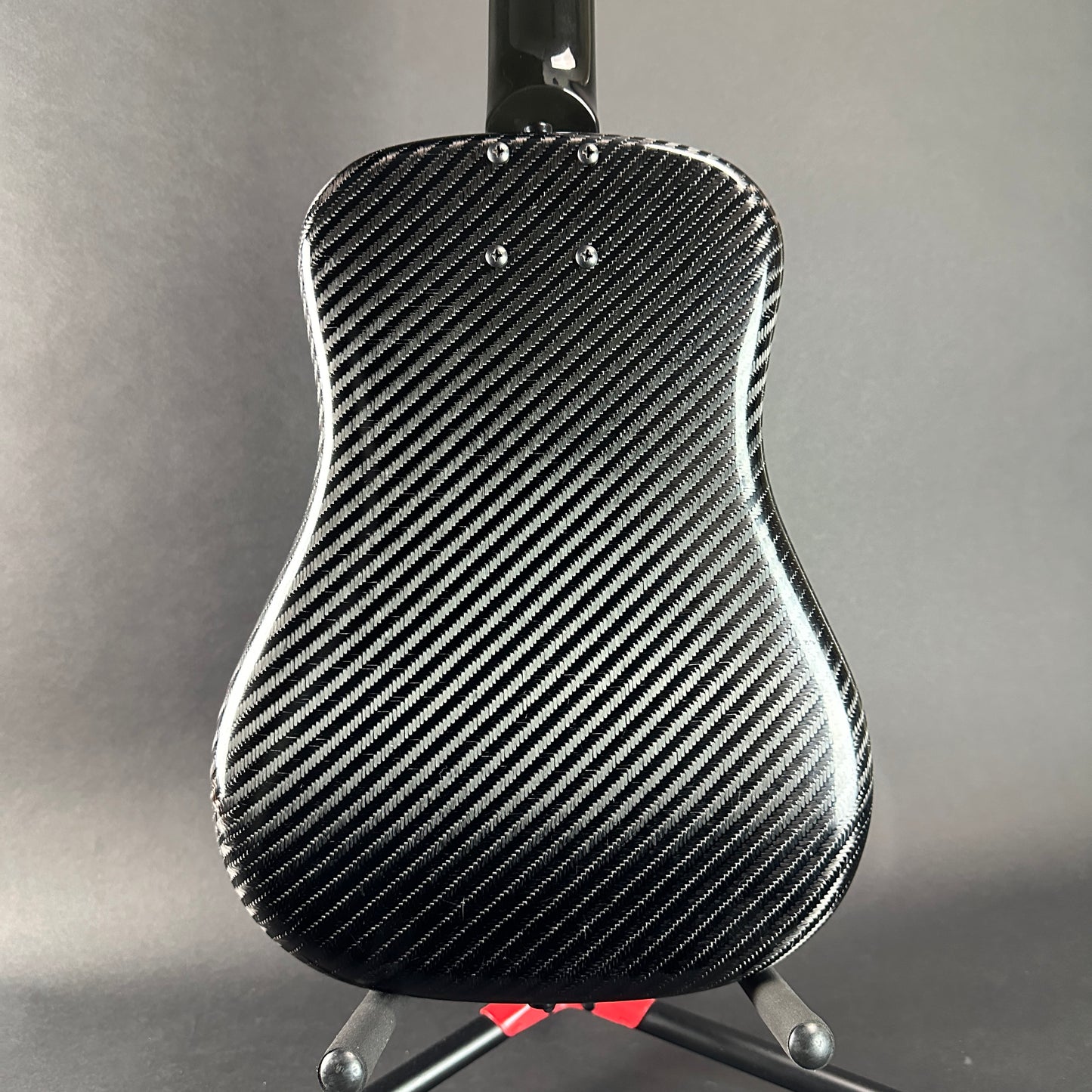 Back of Used Klos Travel Guitar Carbon Fiber.