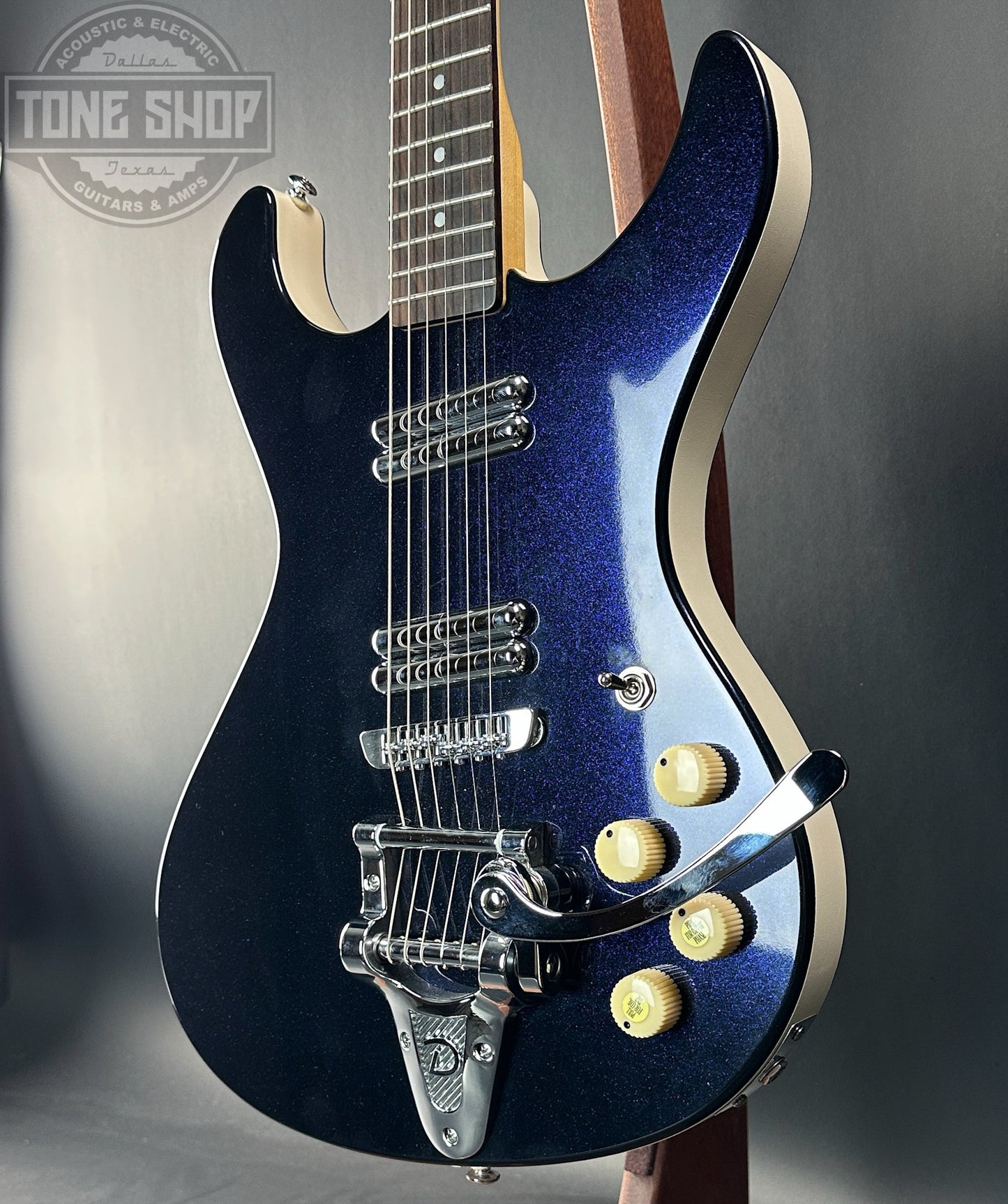 Front angle of Used Danelectro Hodad Blue Sparkle.