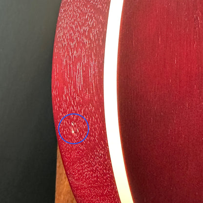 Dent on side of Used Epiphone Les Paul Trad Pro IV Wine.