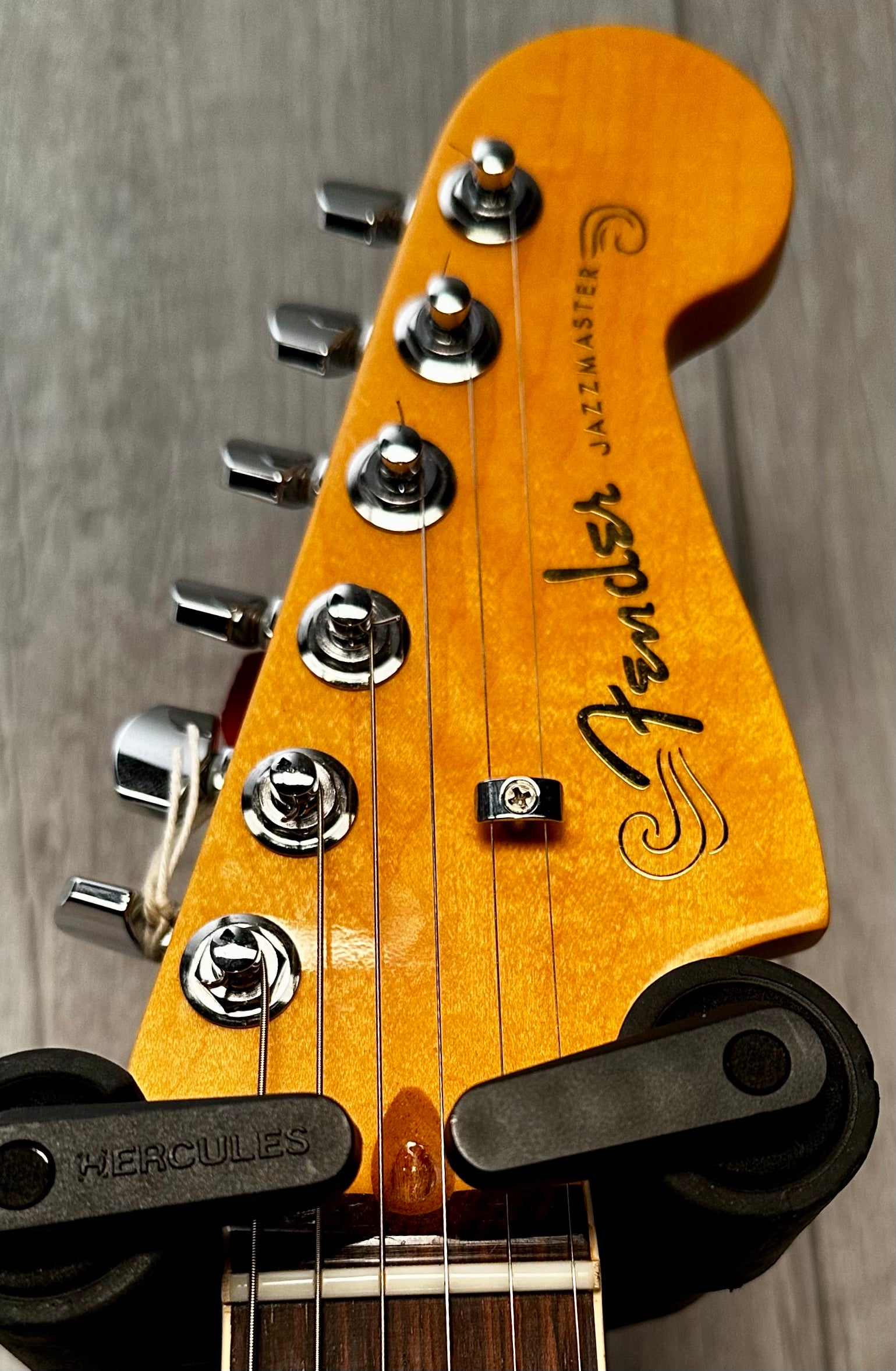 Headstock of Used 2017 Fender American Ultra Jazzmaster Mocha Burst TSS2718.