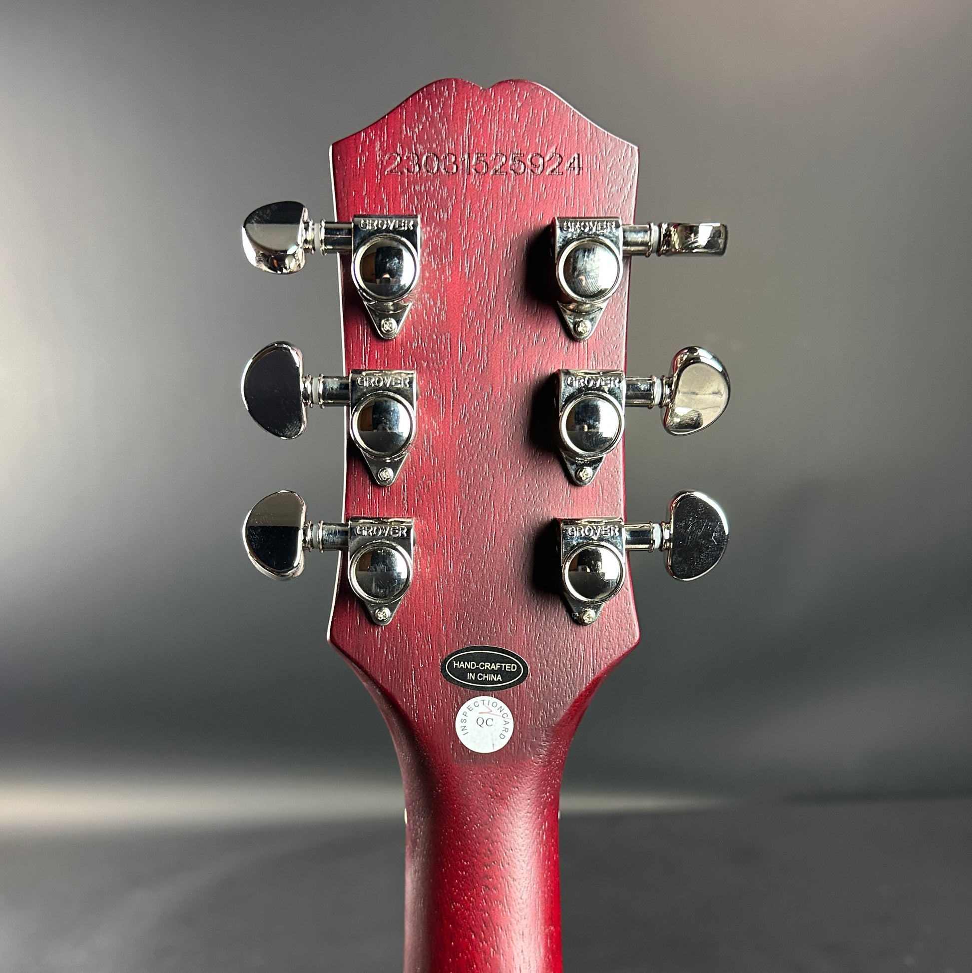 Back of headstock of Used Epiphone Les Paul Trad Pro IV Wine.