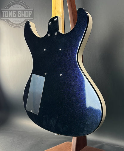 Back angle of Used Danelectro Hodad Blue Sparkle.