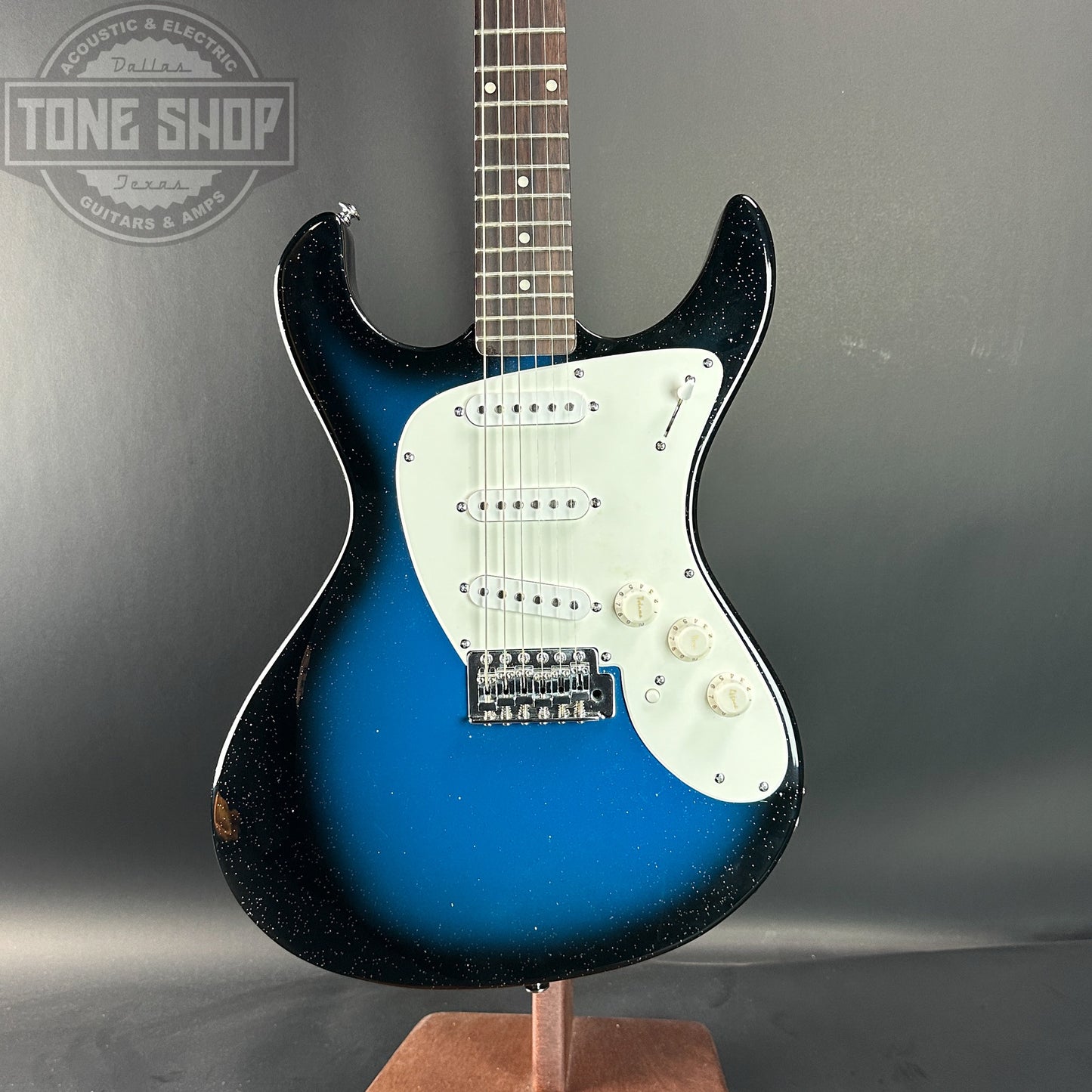 Front of Used Danelectro Danoblaster Hearsay Blue Sparkle Burst.