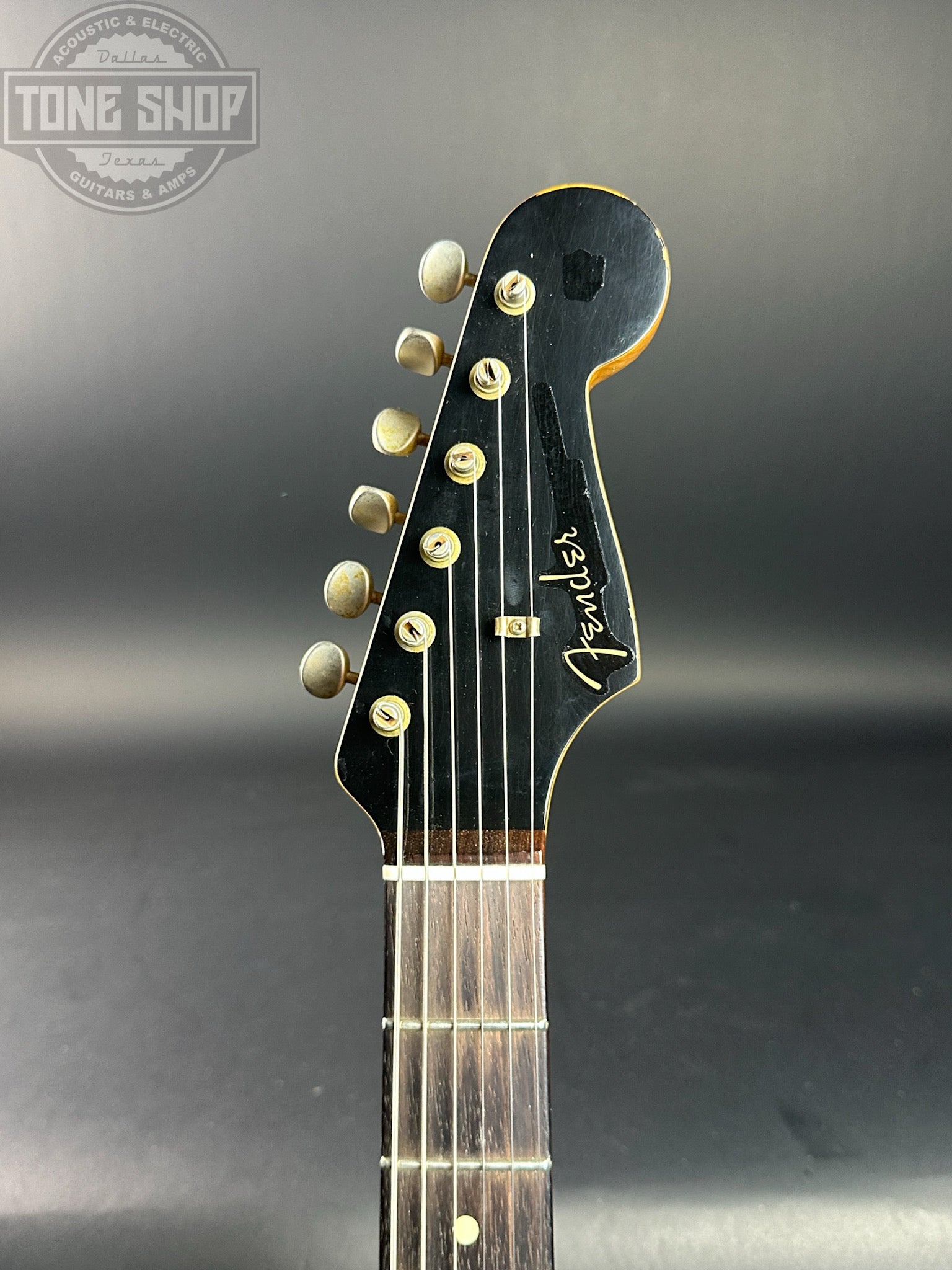 Headstock of Used Fender Ltd Dual Mag II Strat Relic Black.