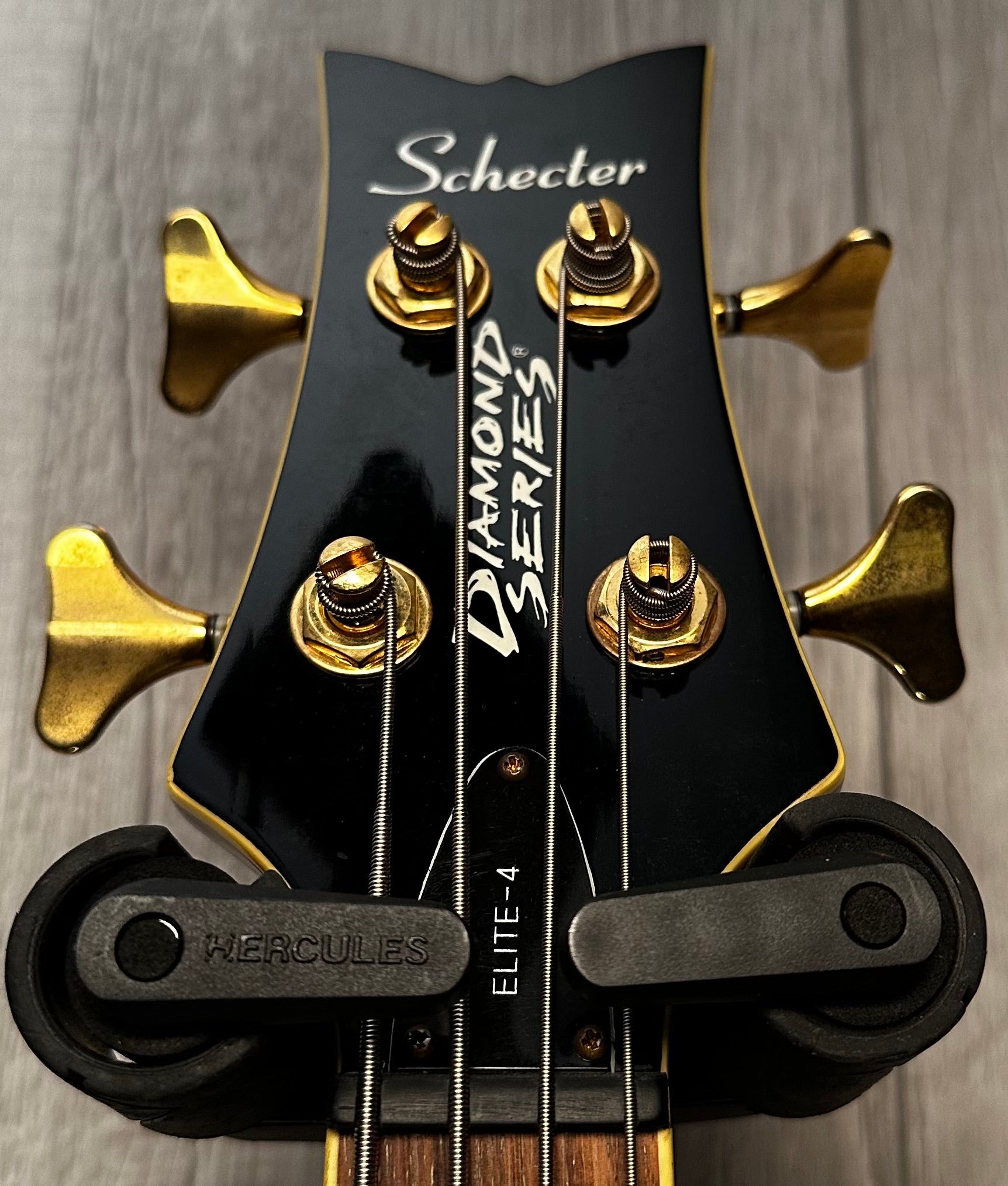 Headstock of Used Schecter Diamond Elite 4 Bass TSS2648.