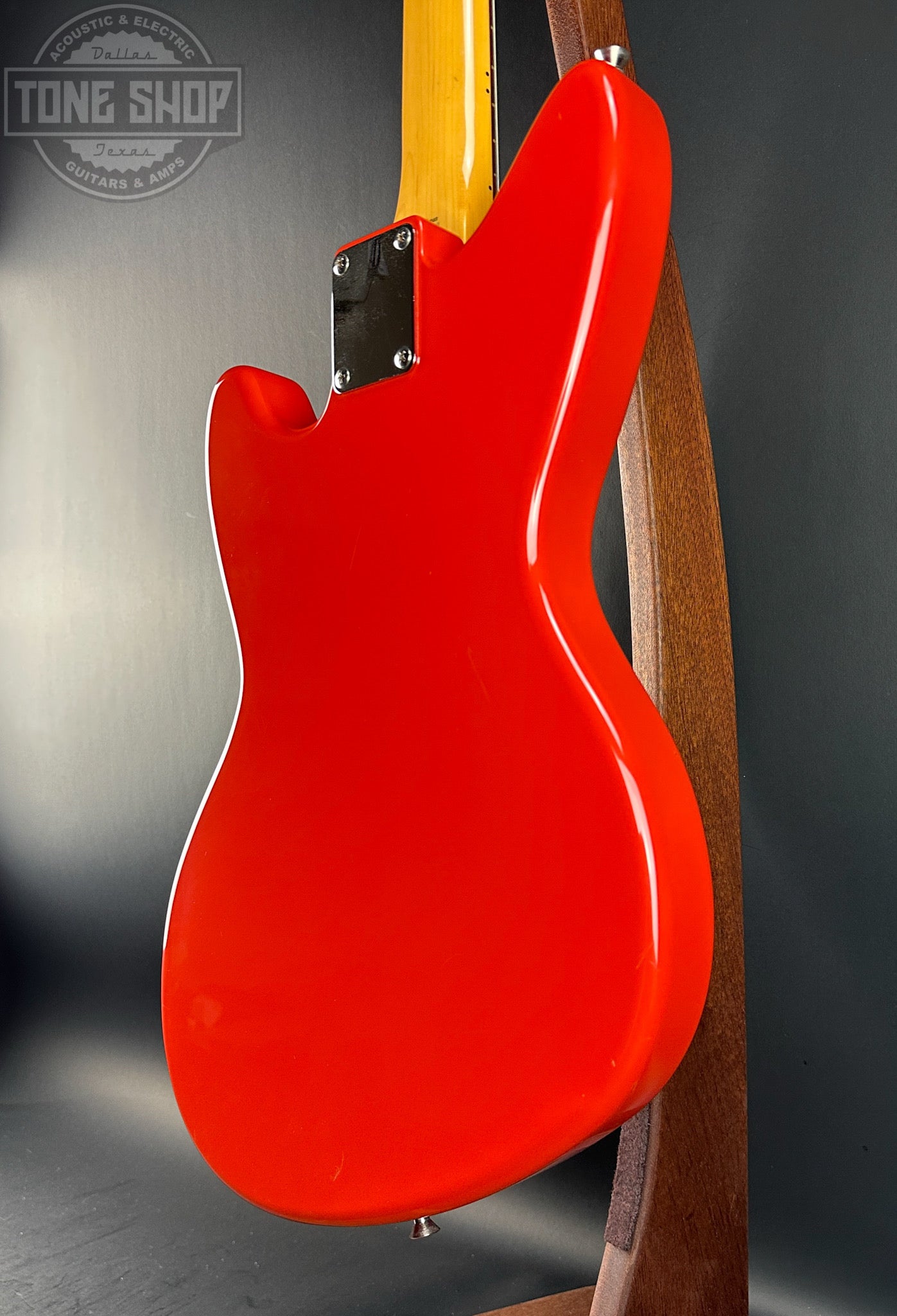 Back angle of Used 2003 Fender MIJ Jag-Stang Fiesta Red.