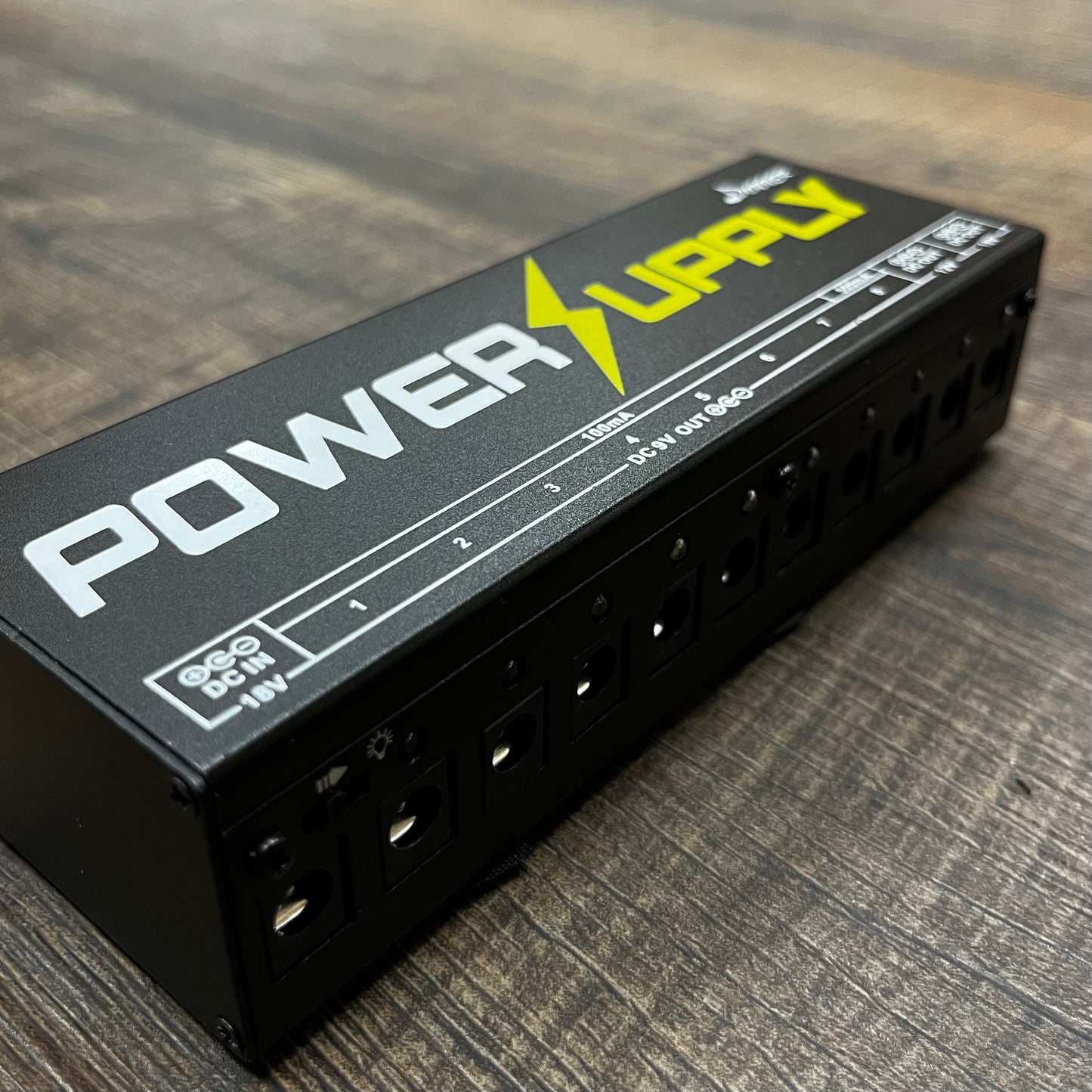 Side of Used Donner Pedal Power Supply TFW53