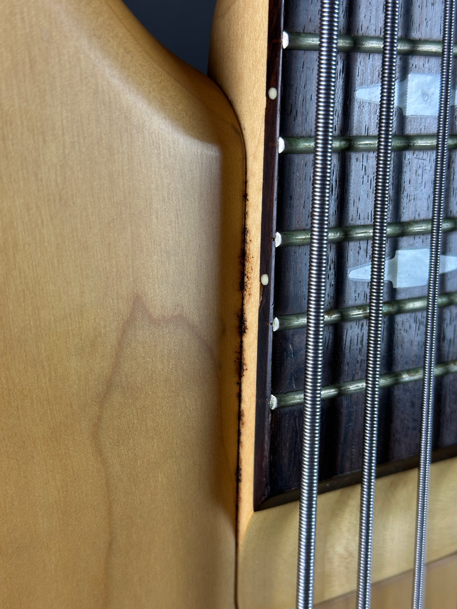 Wear near fretboard of Used 1992 Ibanez GT Series 5-String Bass.