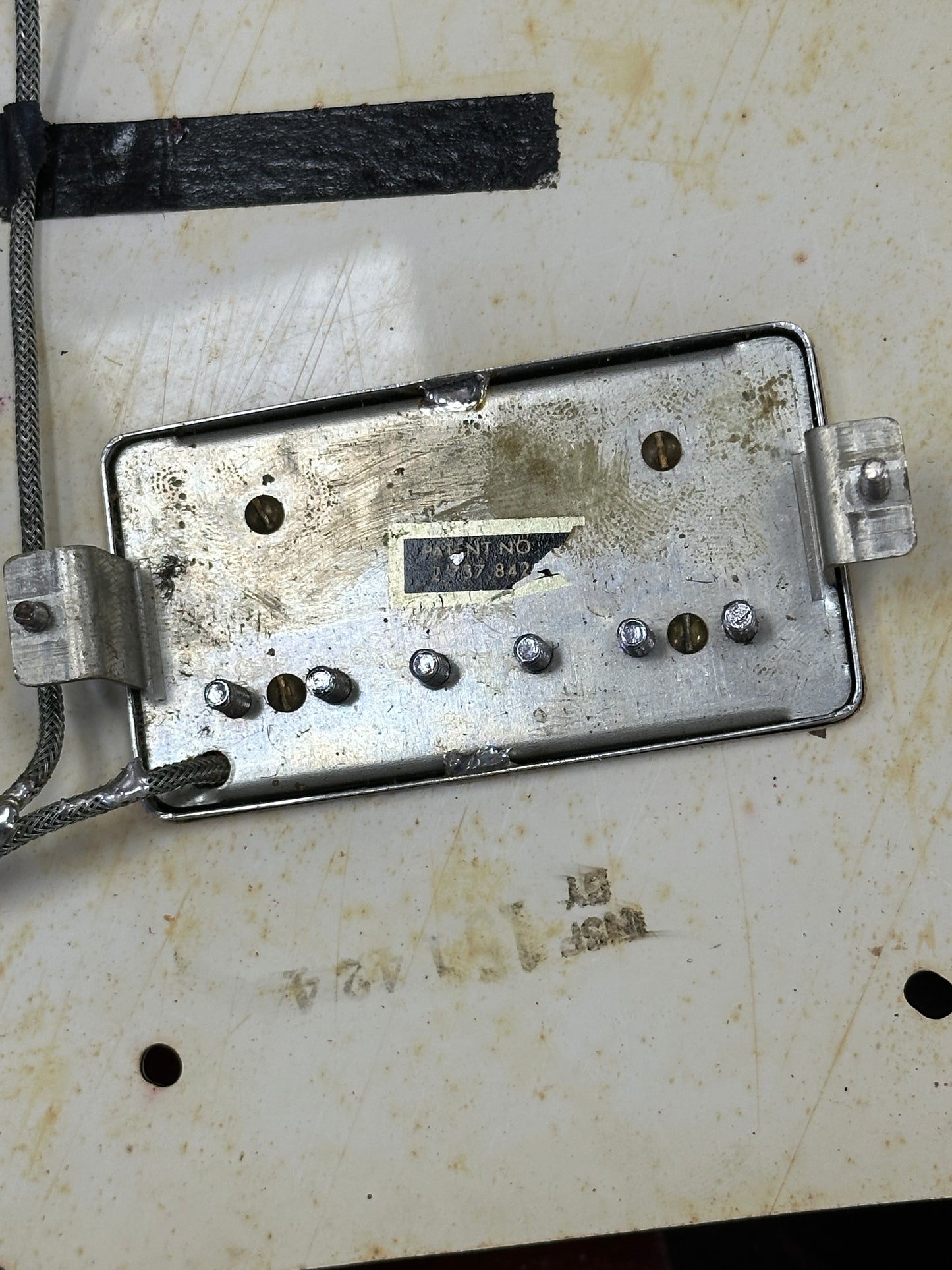 Bottom of pickup of Vintage 1971 Gibson Flying V Medallion #145.