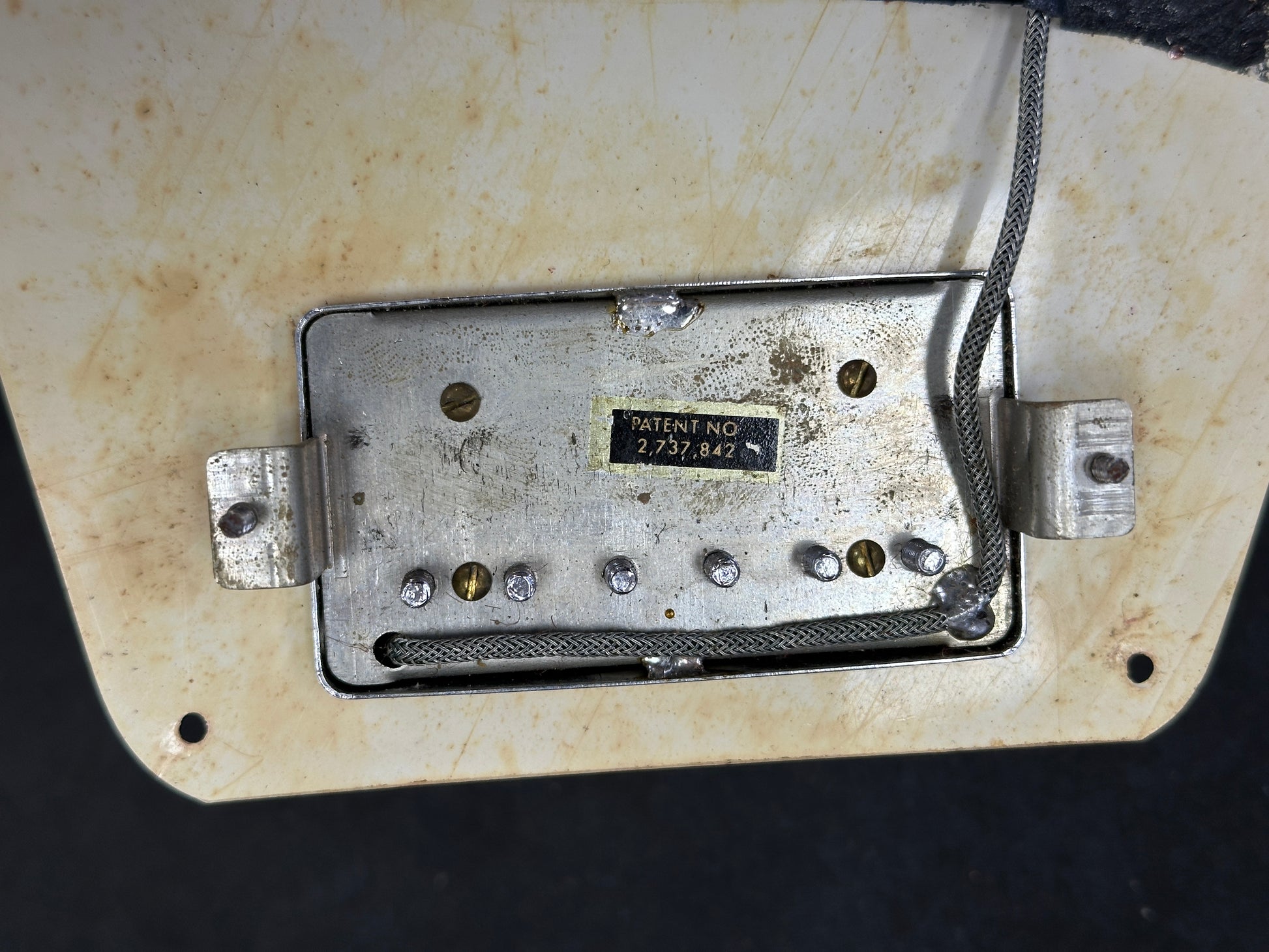 Bottom of pickup of Vintage 1971 Gibson Flying V Medallion #145.