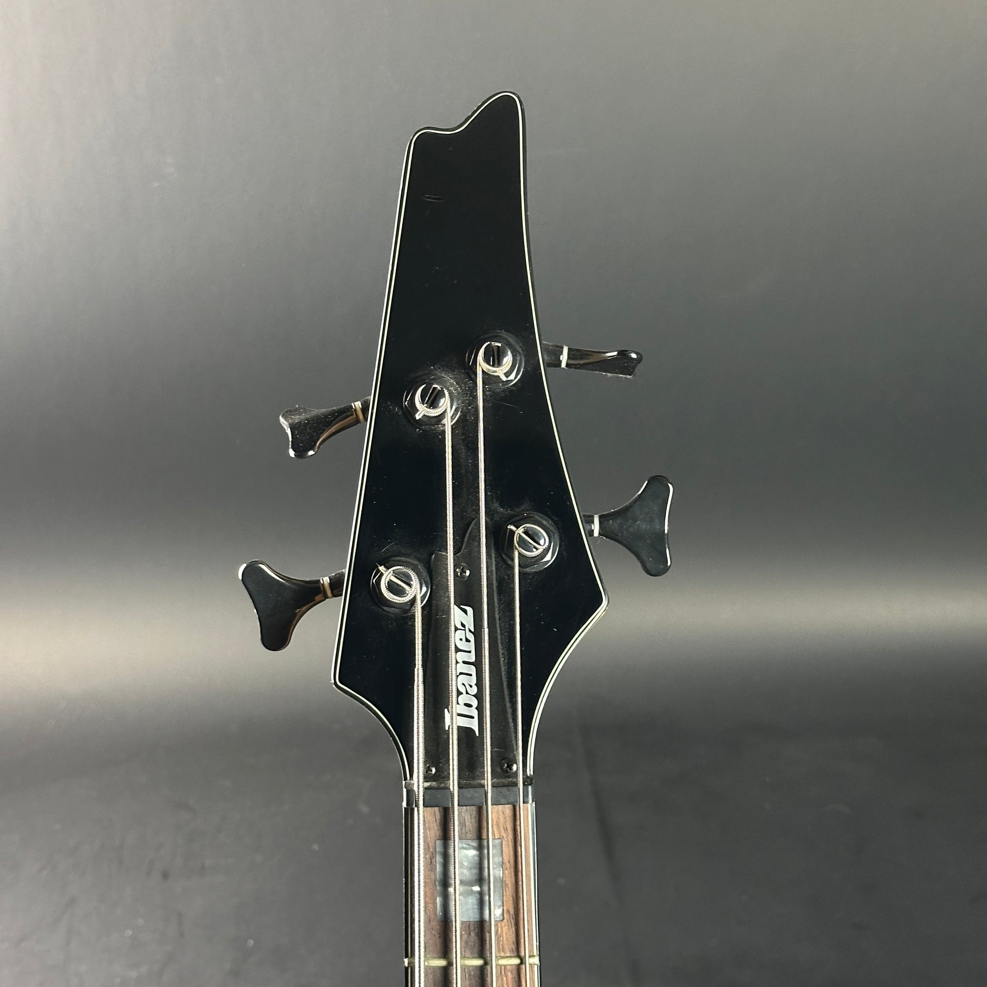 Headstock of Used Ibanez Iceman ICB300EX Bass Black.