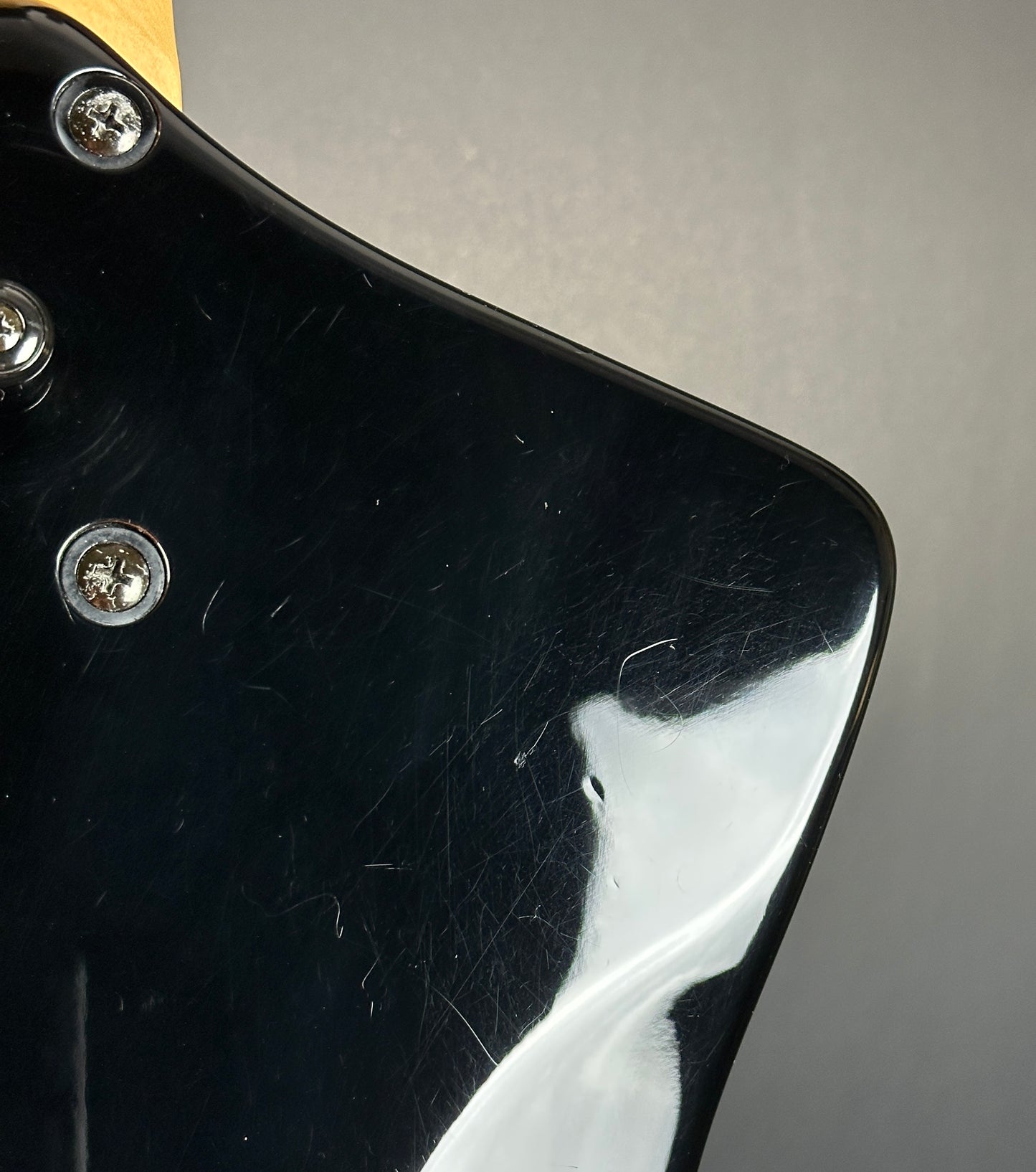 Scratches on back of Used Ibanez Iceman ICB300EX Bass Black.