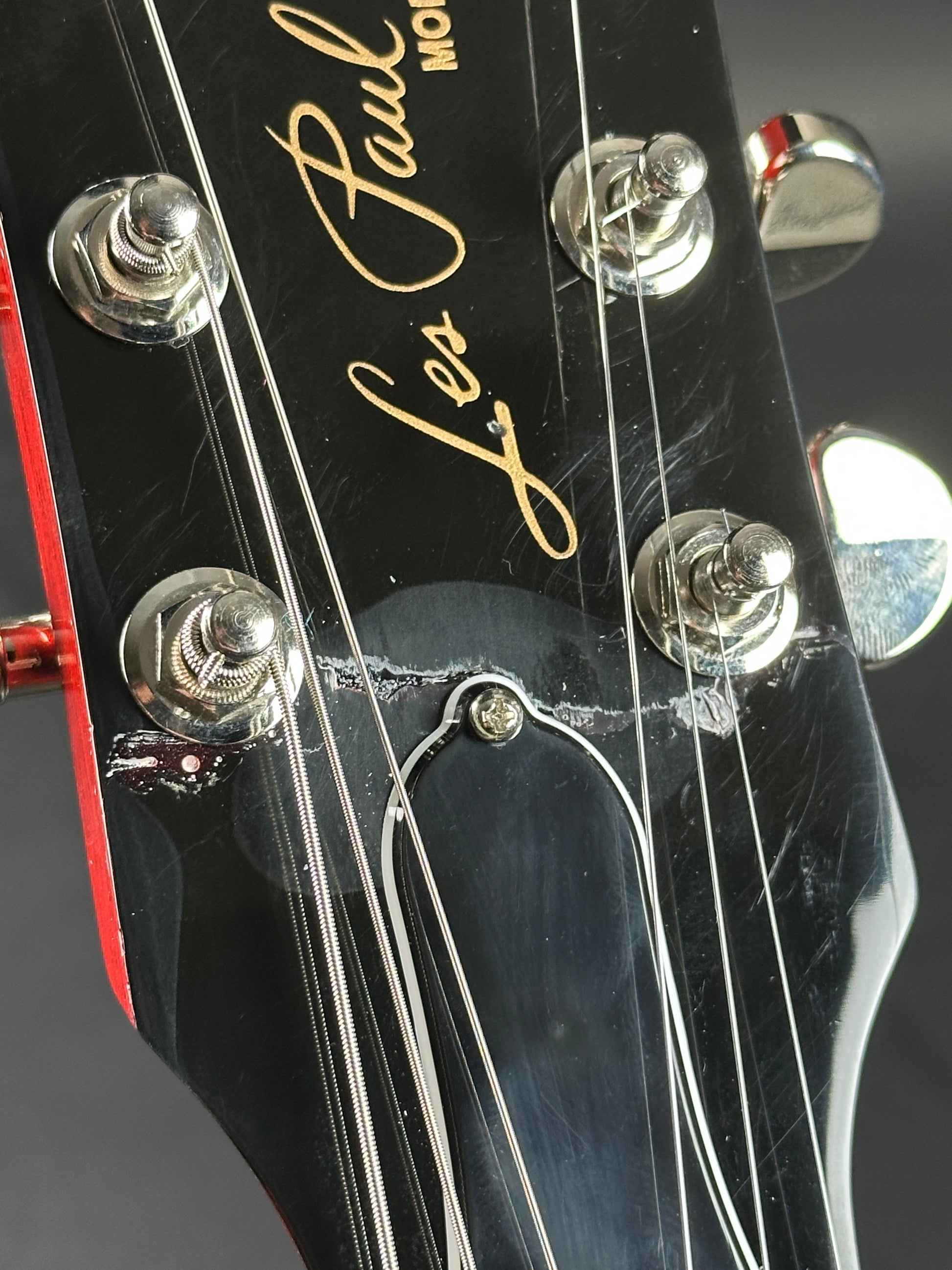 Repaired crack in headstock of Used Gibson Les Paul Standard 60s Iced Tea.