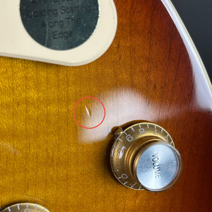 Small dent on body of Used Gibson Les Paul Standard 60s Iced Tea.