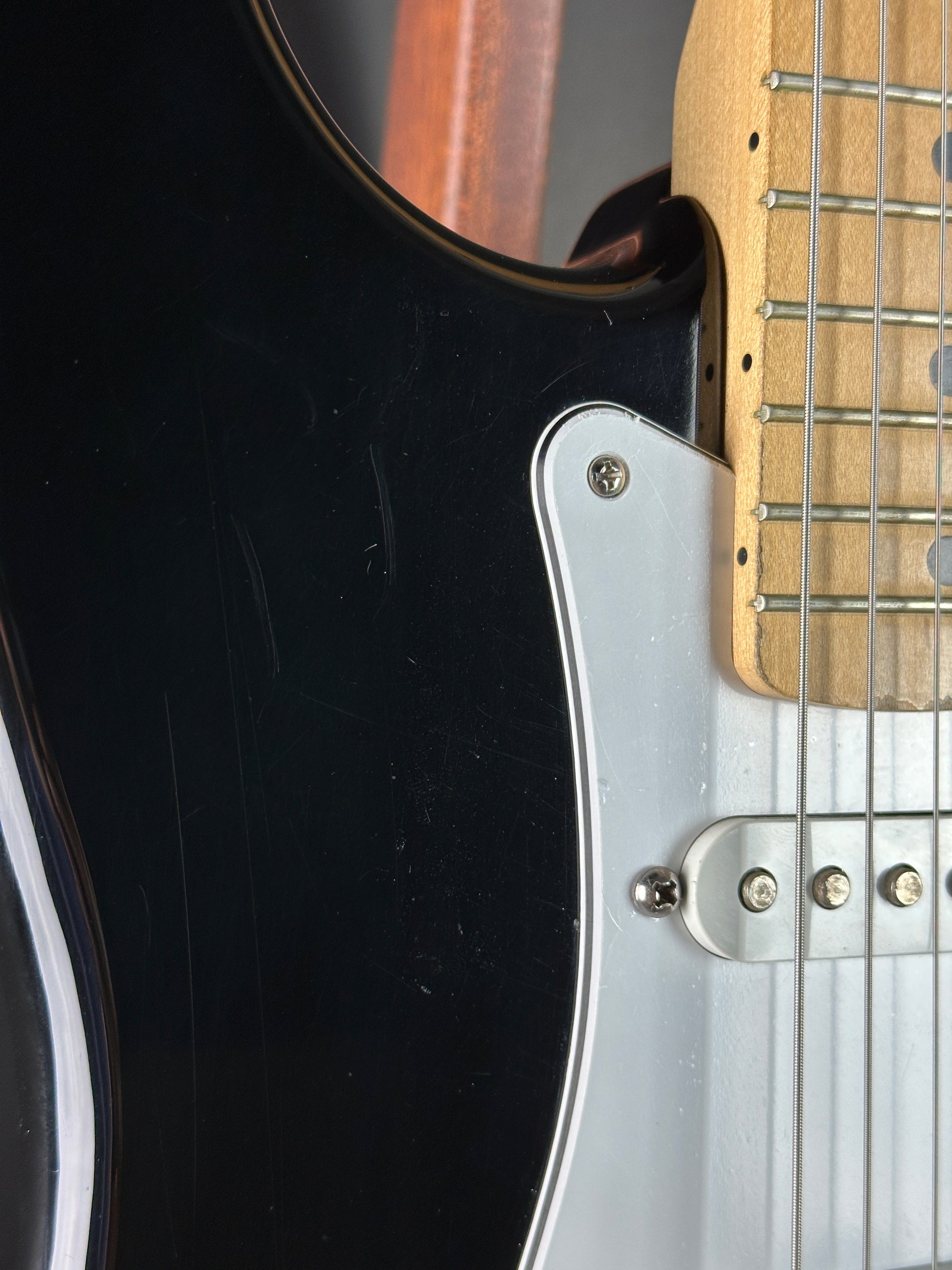 Scratches on front of Used Fender MIM Standard Strat Black.