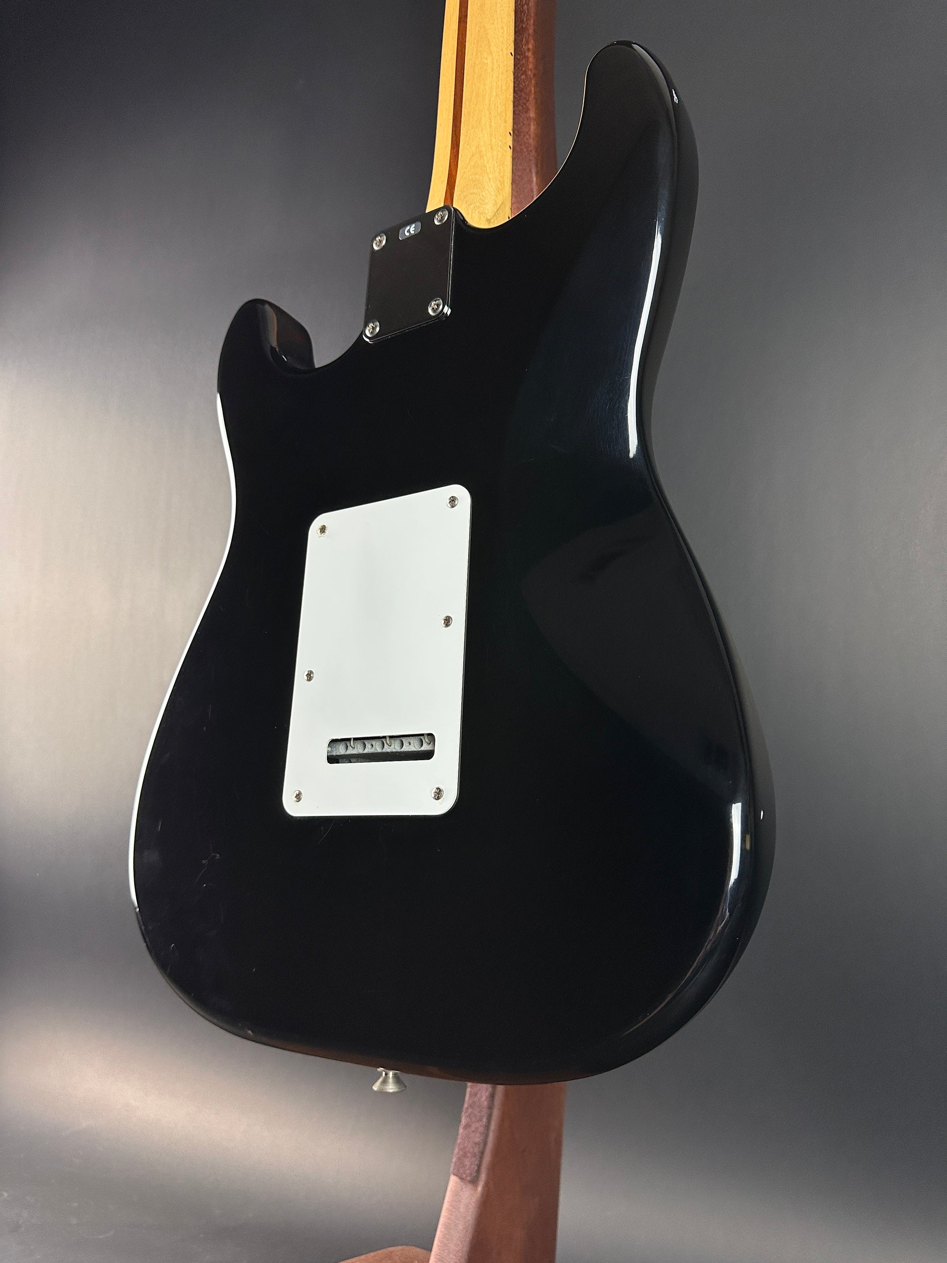 Back angle of Used Fender MIM Standard Strat Black.