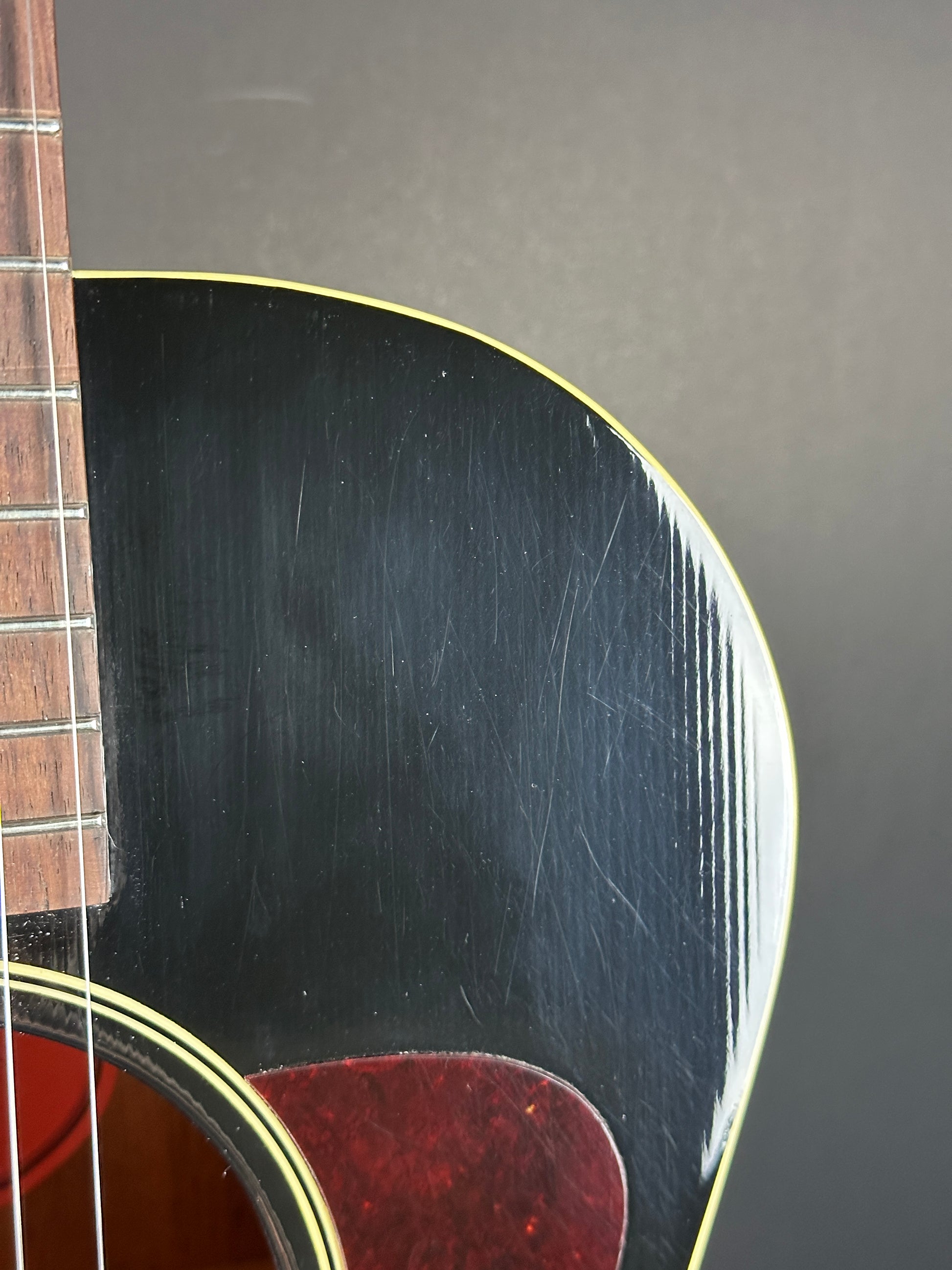 Scratches on front of Used 2023 Gibson L-00 Black.