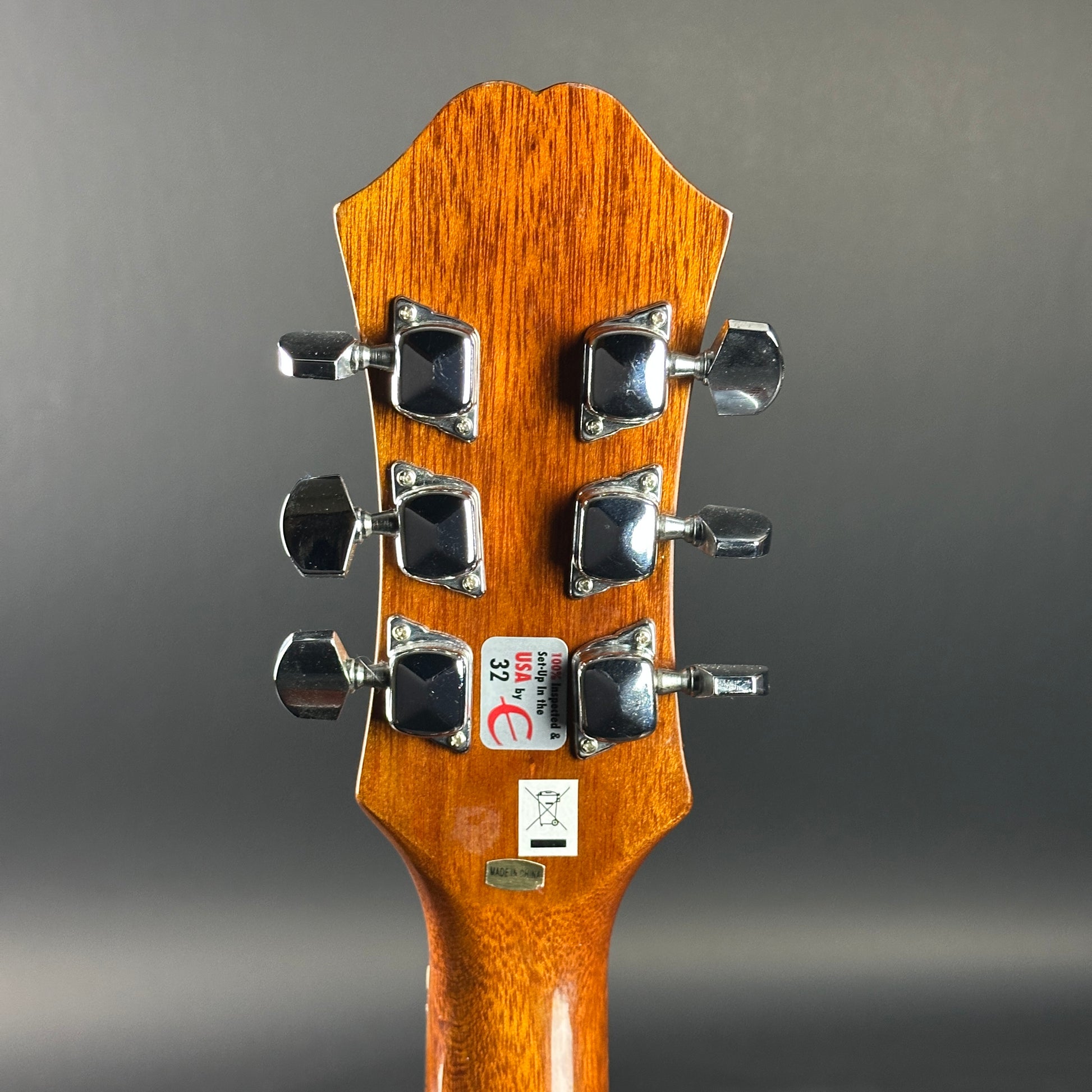 Back of headstock of Used Epiphone PR-150 Acoustic Natural.