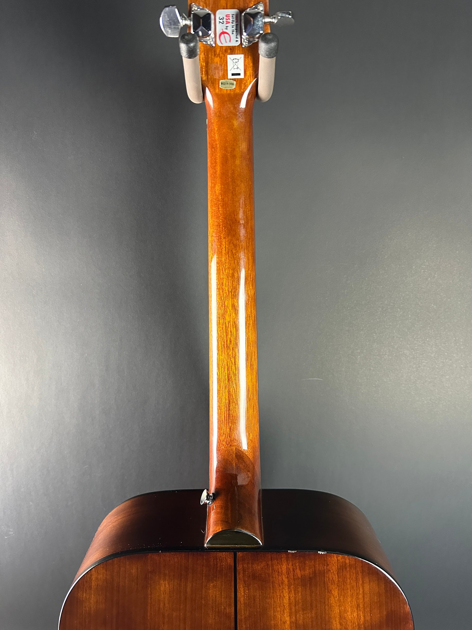 Back of neck of Used Epiphone PR-150 Acoustic Natural.