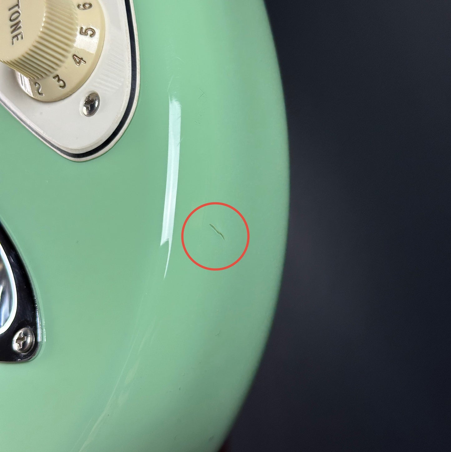 Small dent on the side of Used Fender American Professional II Surf Green Roasted Neck.