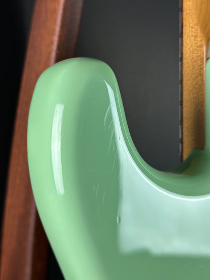 Scratches on back of Used Fender American Professional II Surf Green Roasted Neck.