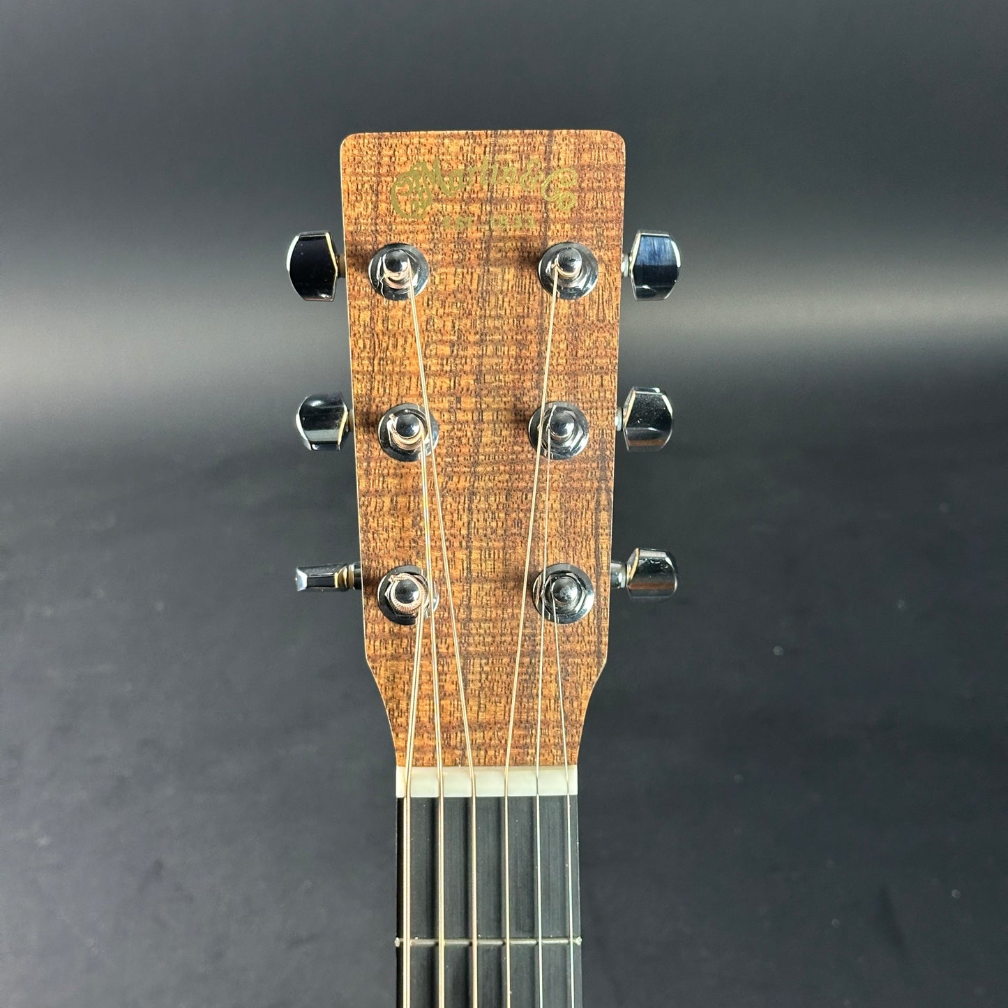 Headstock of Used Martin X Series GPC-X1E Koa.