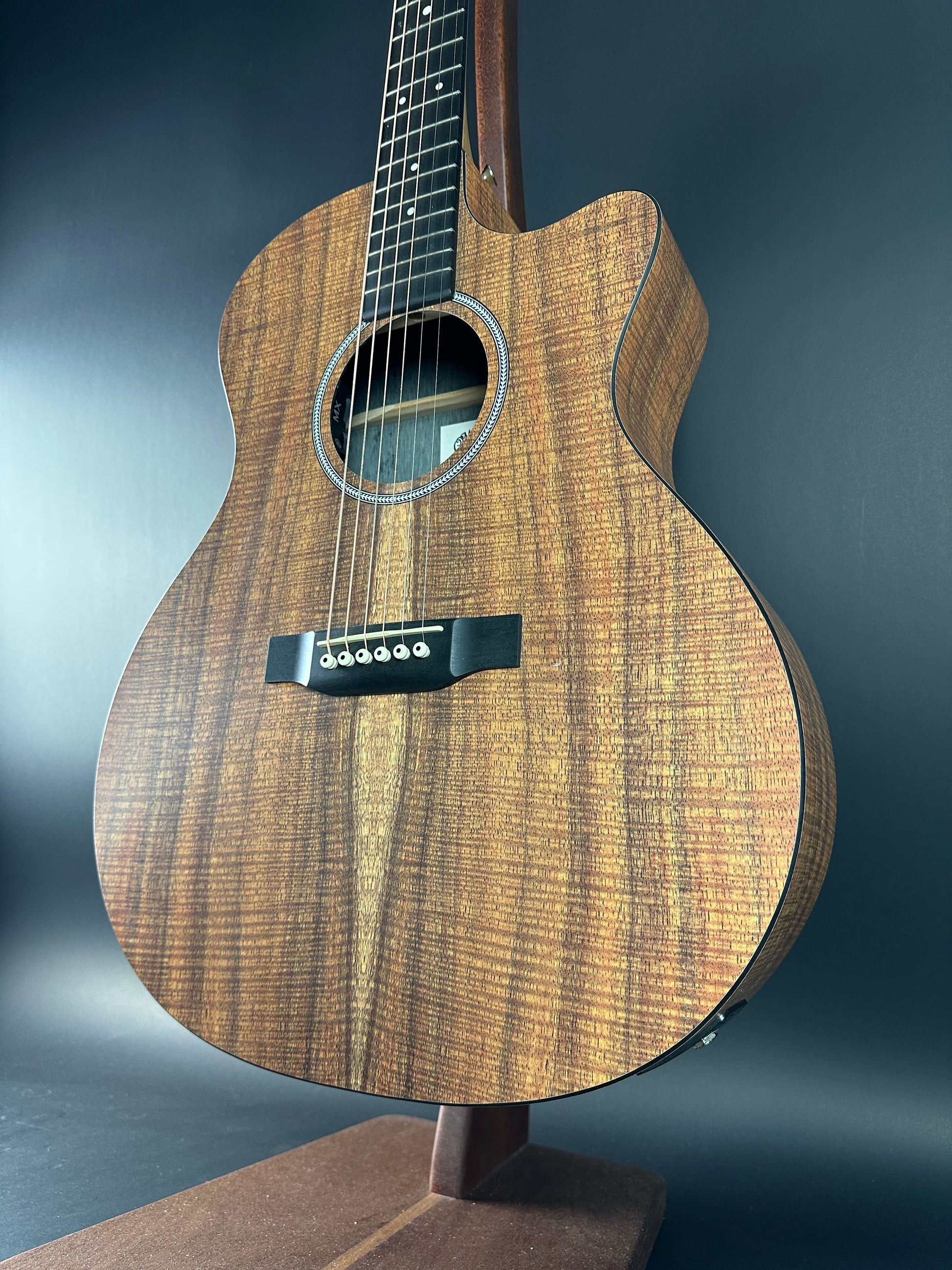 Front angle of Used Martin X Series GPC-X1E Koa.