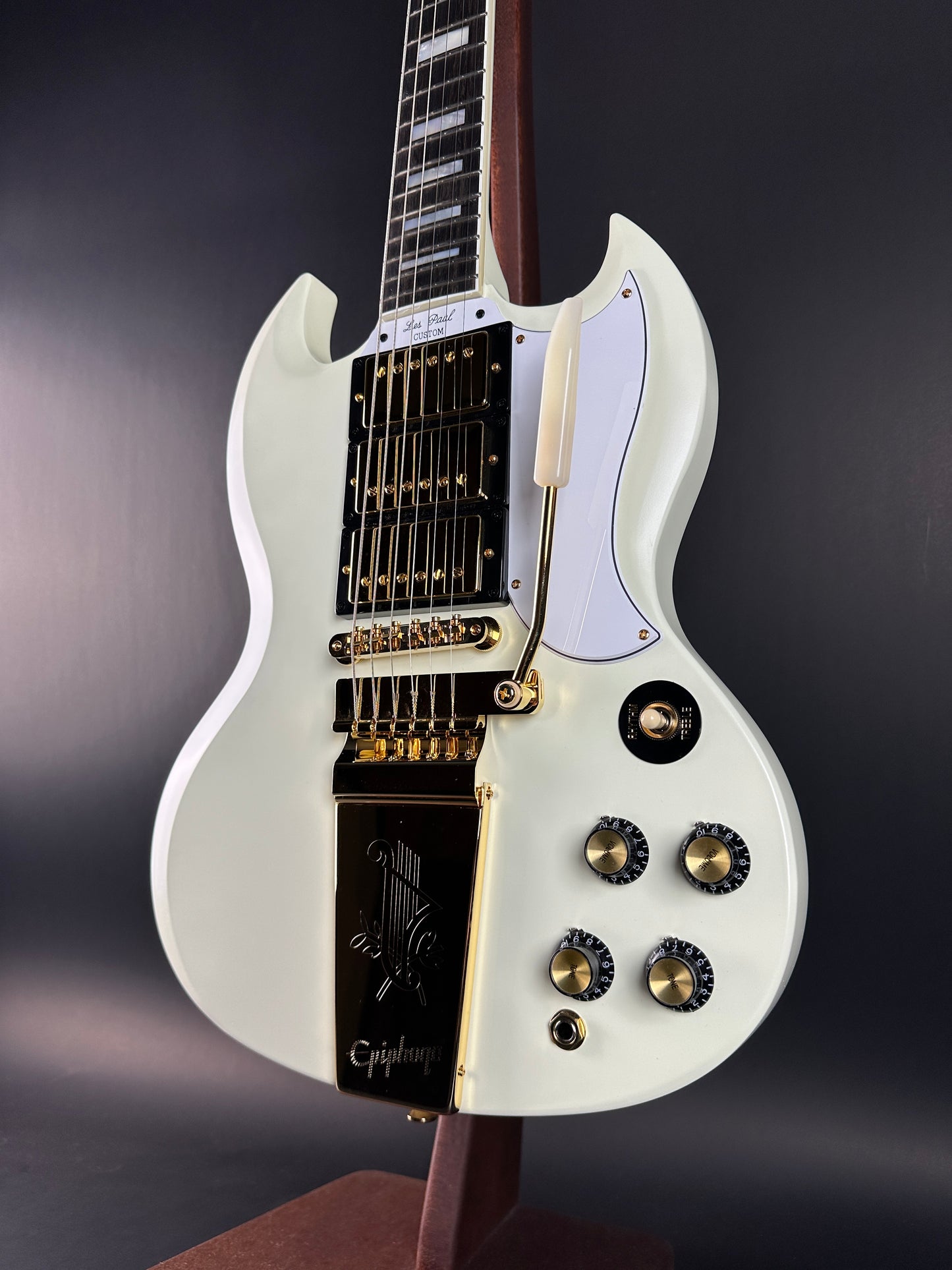 Front angle of Used Epiphone Inspired by Gibson 1963 Les Paul SG Custom Vibrola Classic White.