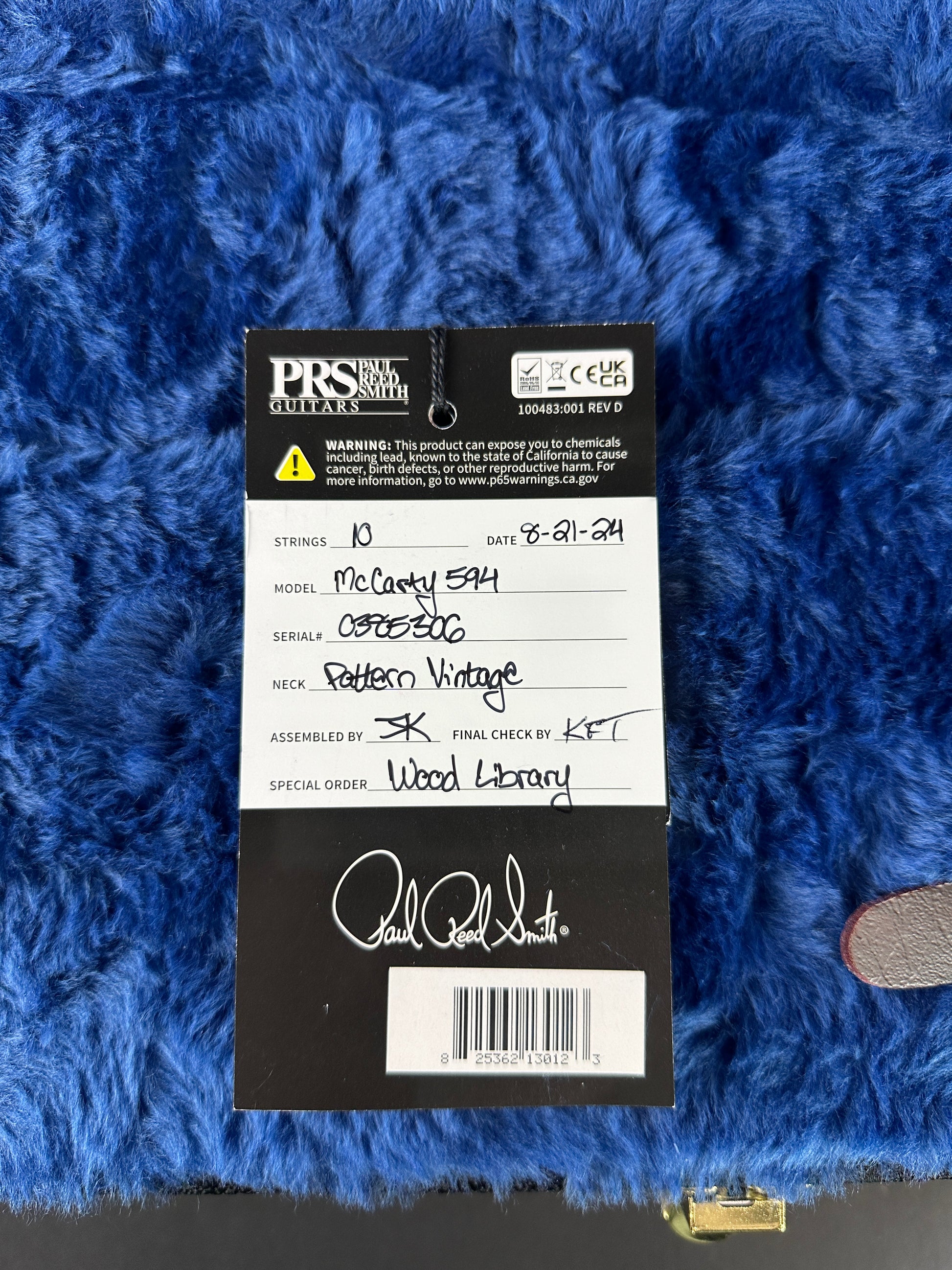 Hang tag for PRS Wood Library McCarty 594 10-top Quilt Copperhead Burst.