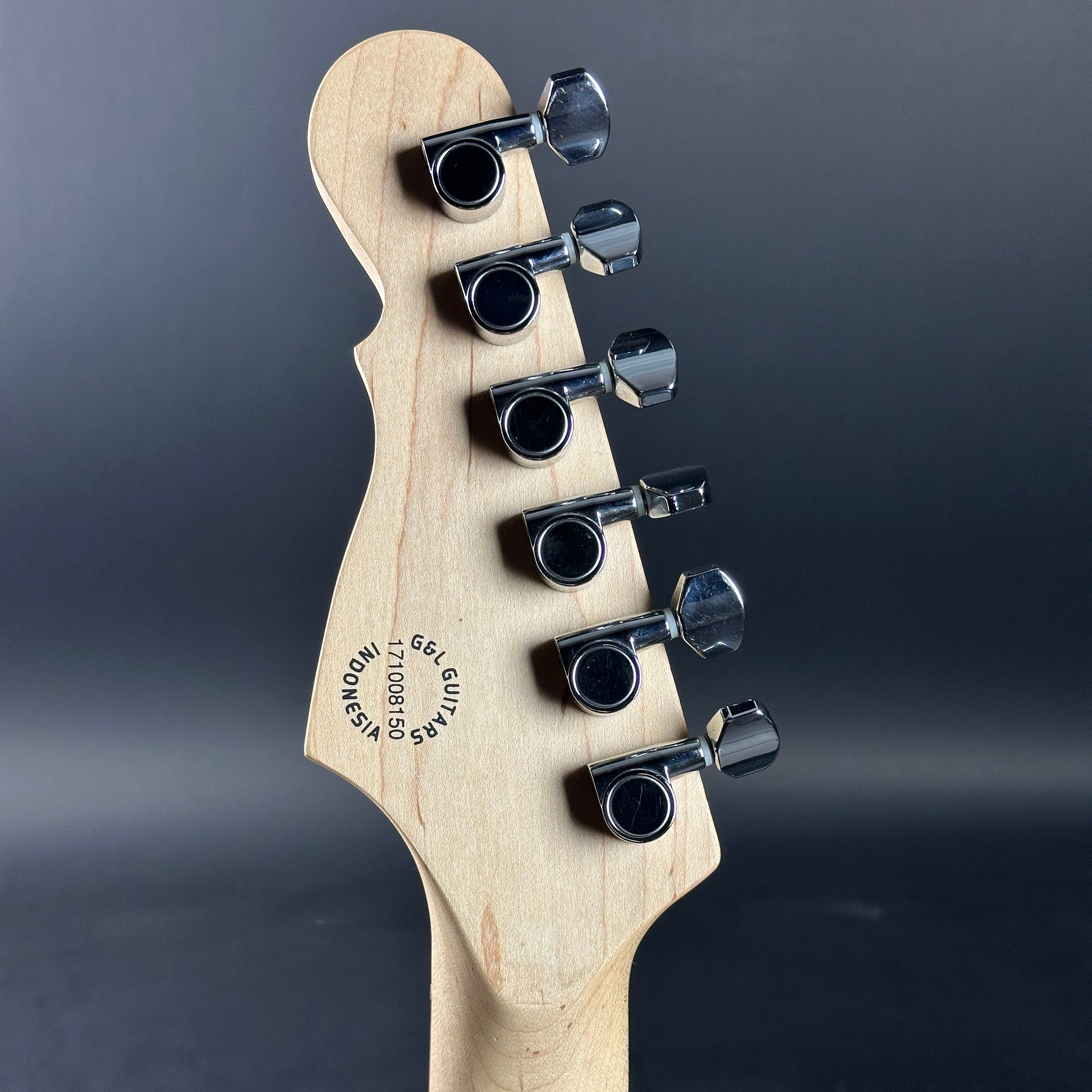 Back of headstock of Used G&L Tribute Legacy Irish Ale.